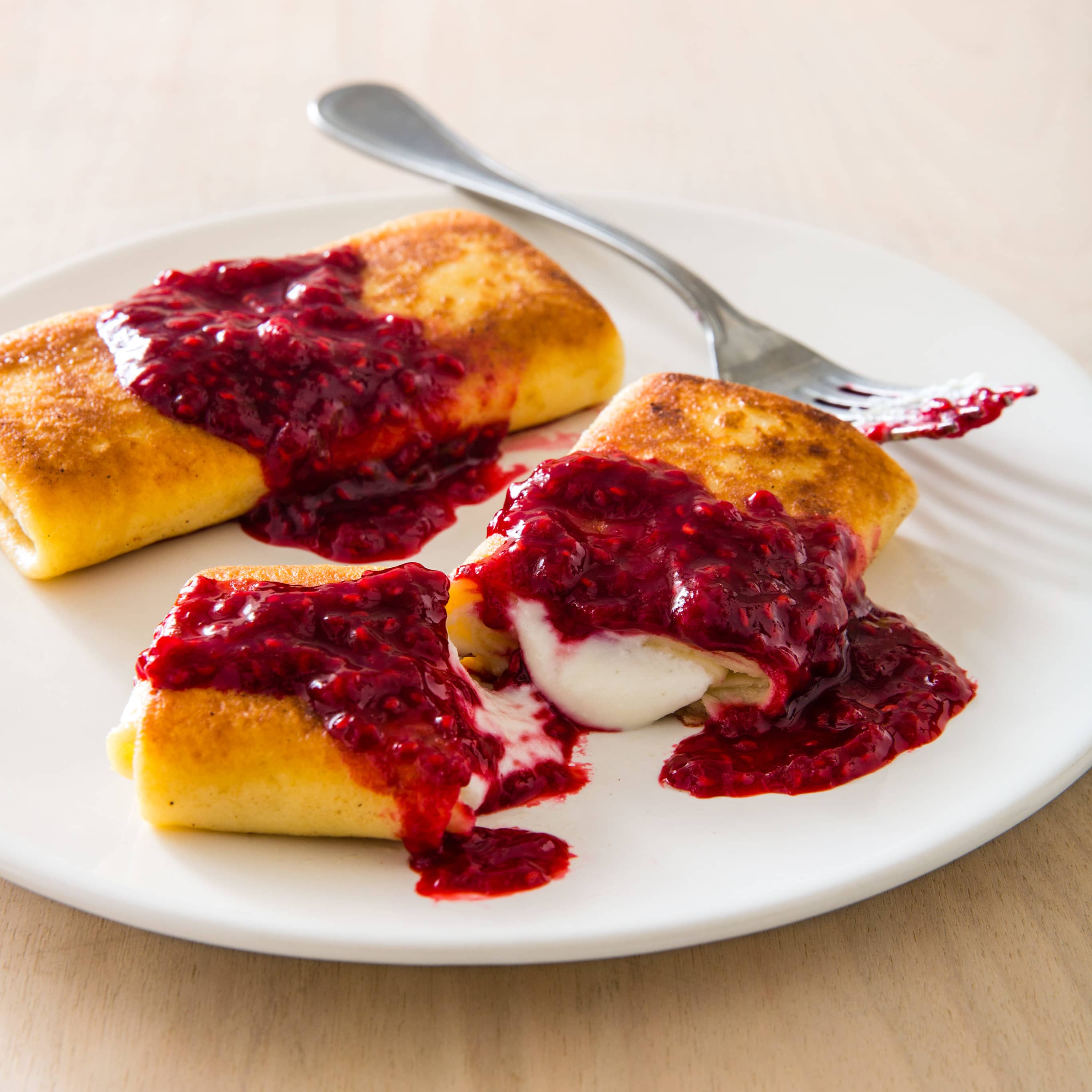Cheese Blintzes with Raspberry Sauce | America's Test Kitchen
