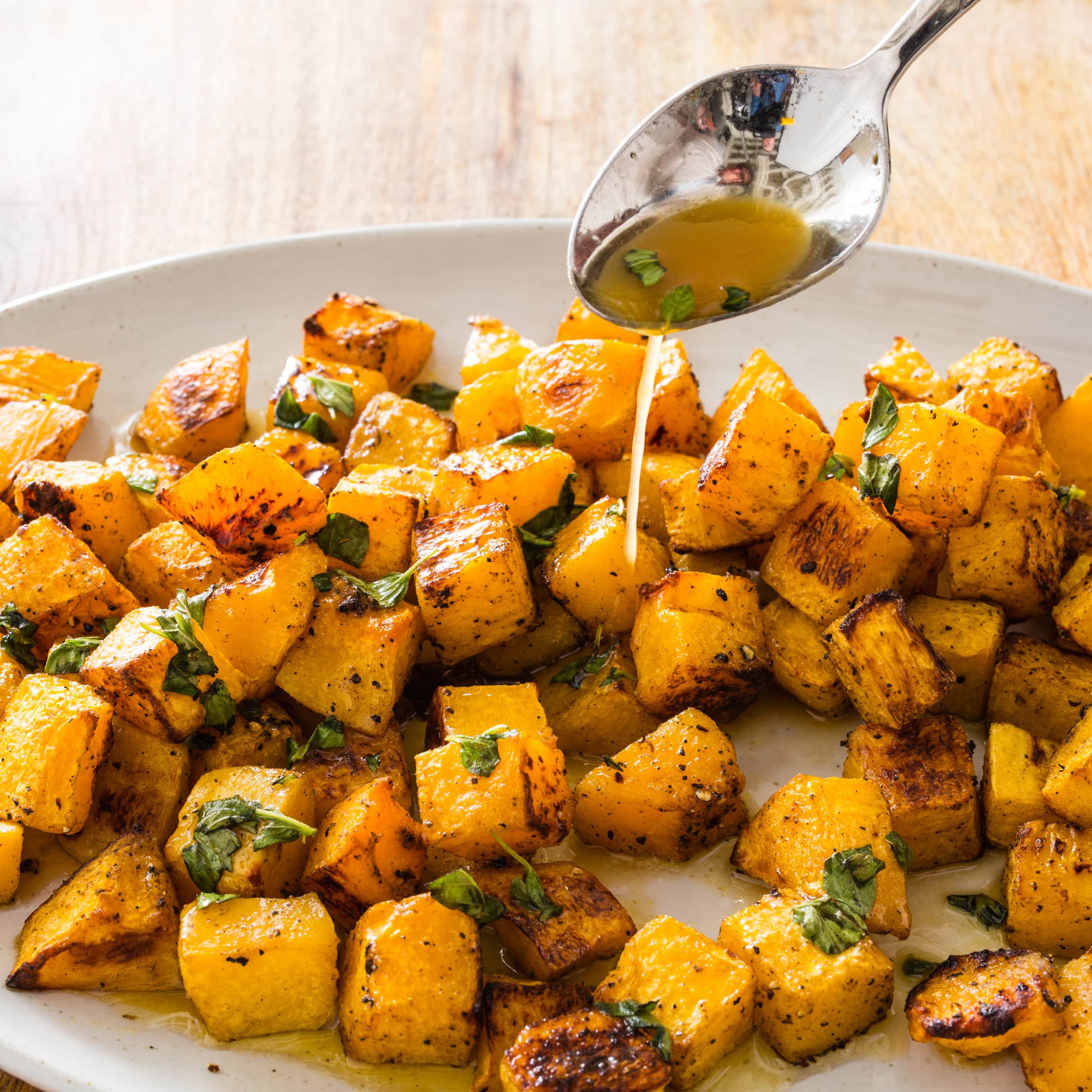 Spice-Roasted Butternut Squash with Honey-Orange Butter | America's Test Kitchen