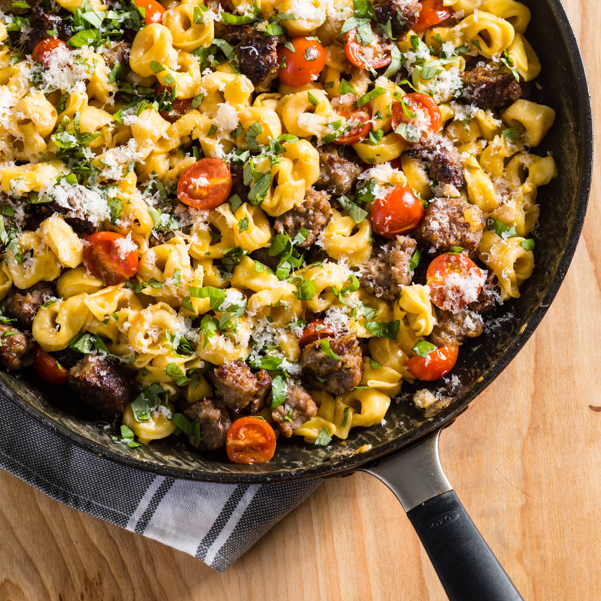Skillet Tortellini with Sausage and Cherry Tomatoes | America's Test Kitchen