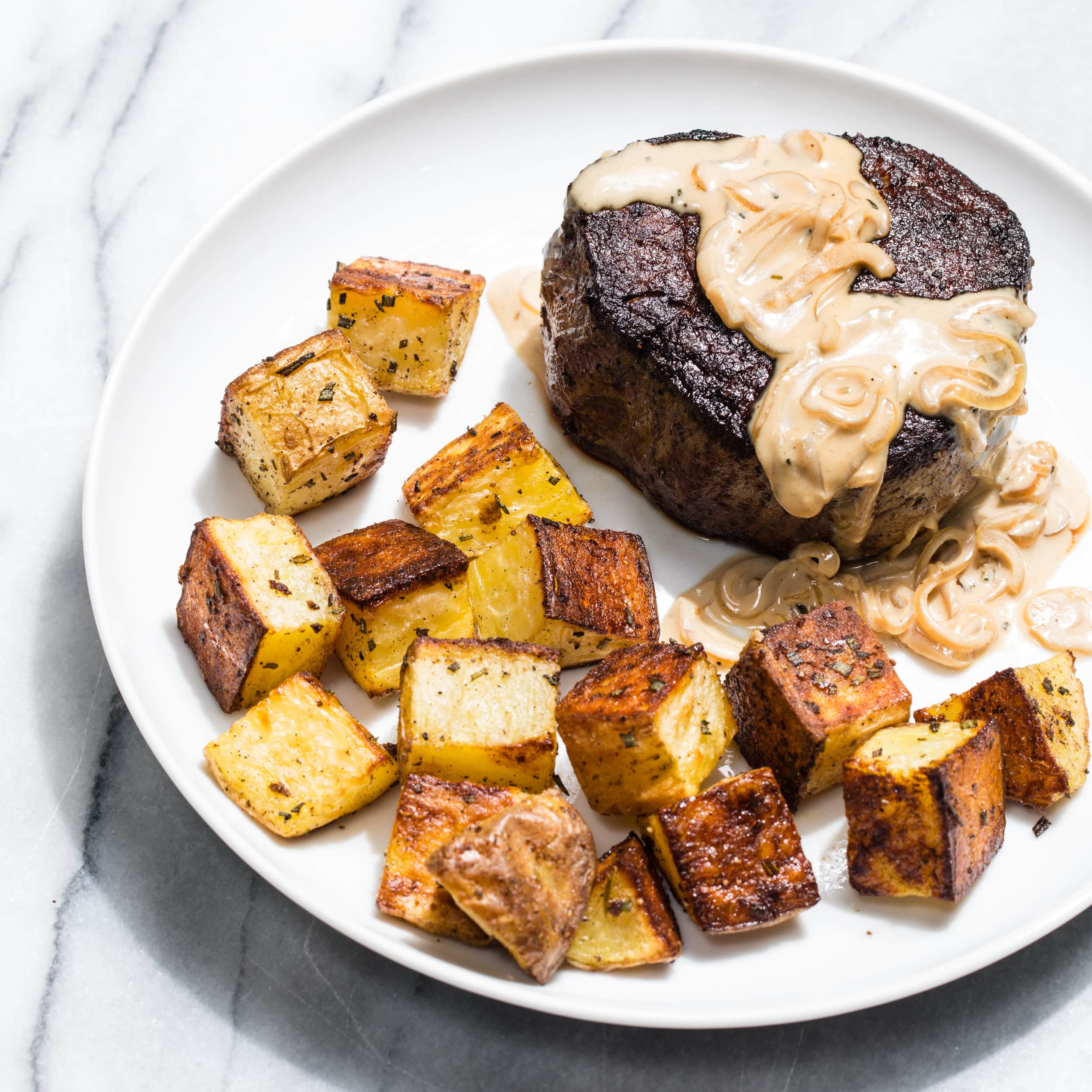 Filets Mignons with Rosemary Potatoes and Bourbon Cream Sauce