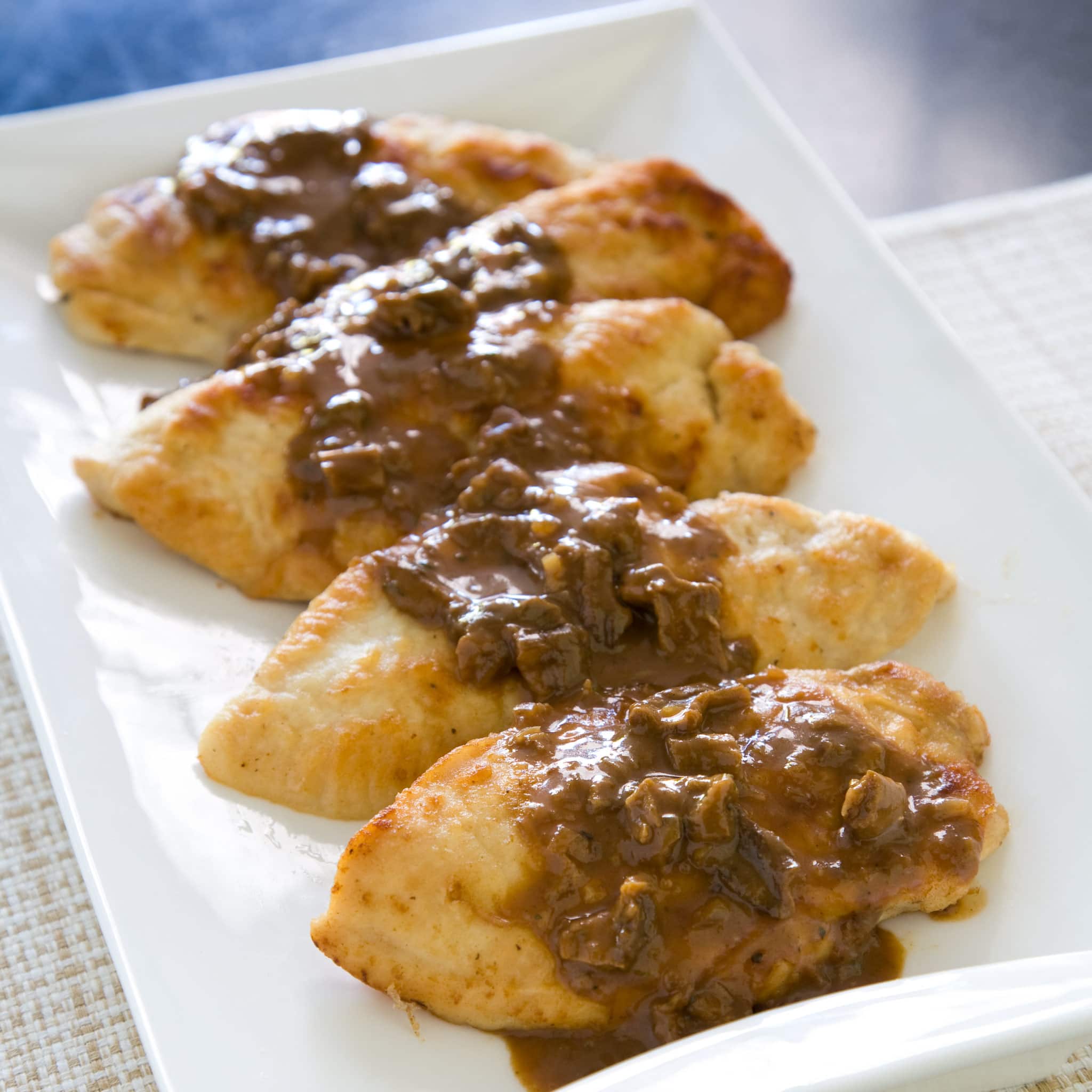 Sautéed Chicken Cutlets with Porcini Sauce | America's Test Kitchen