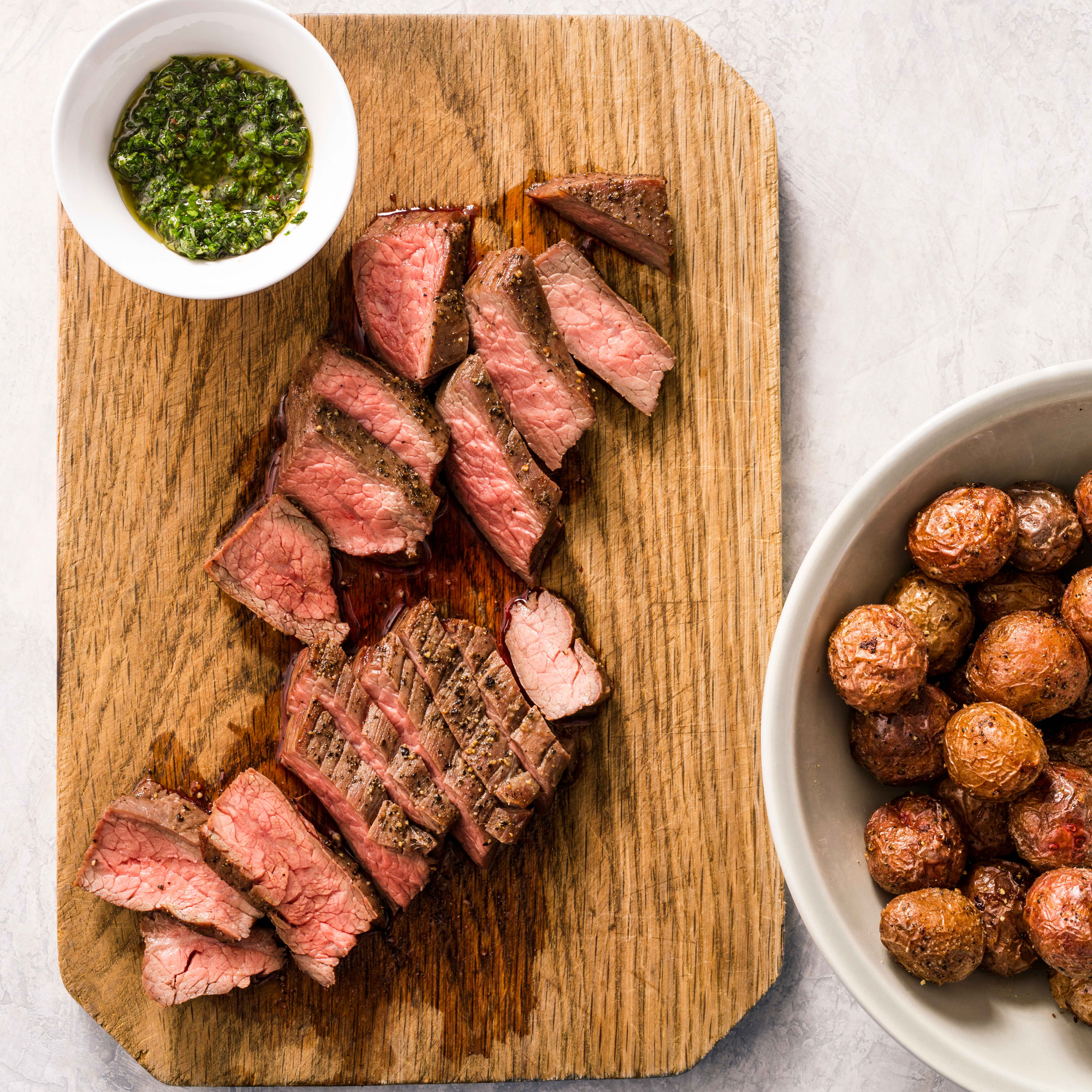 Air-Fryer Flank Steak with Roasted Potatoes and Chimichurri | America's Test Kitchen