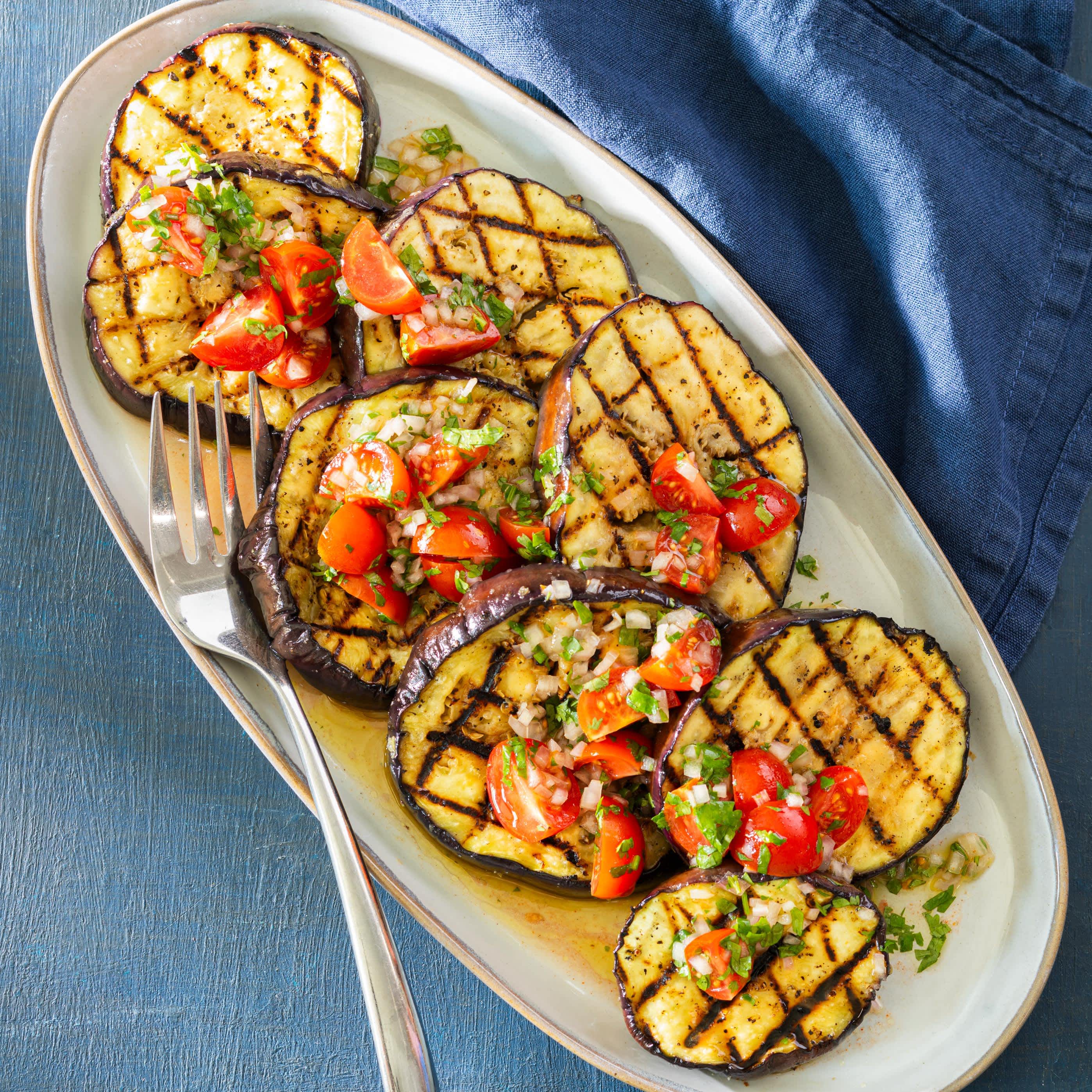 Grilled Eggplant with Cherry Tomatoes and Cilantro Vinaigrette | America's Test Kitchen