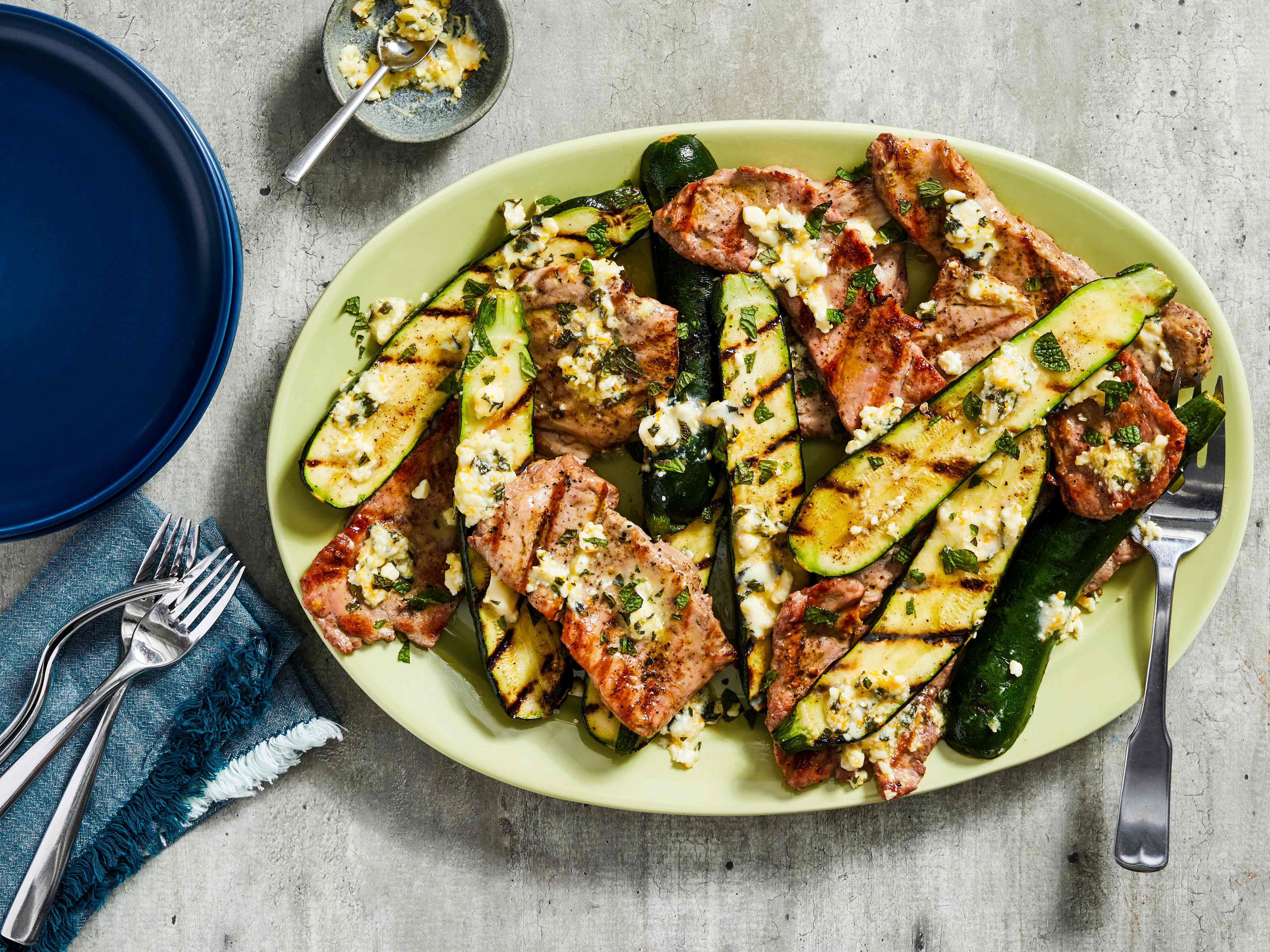 Grilled Pork Cutlets and Zucchini with Feta and Mint Compound Butter