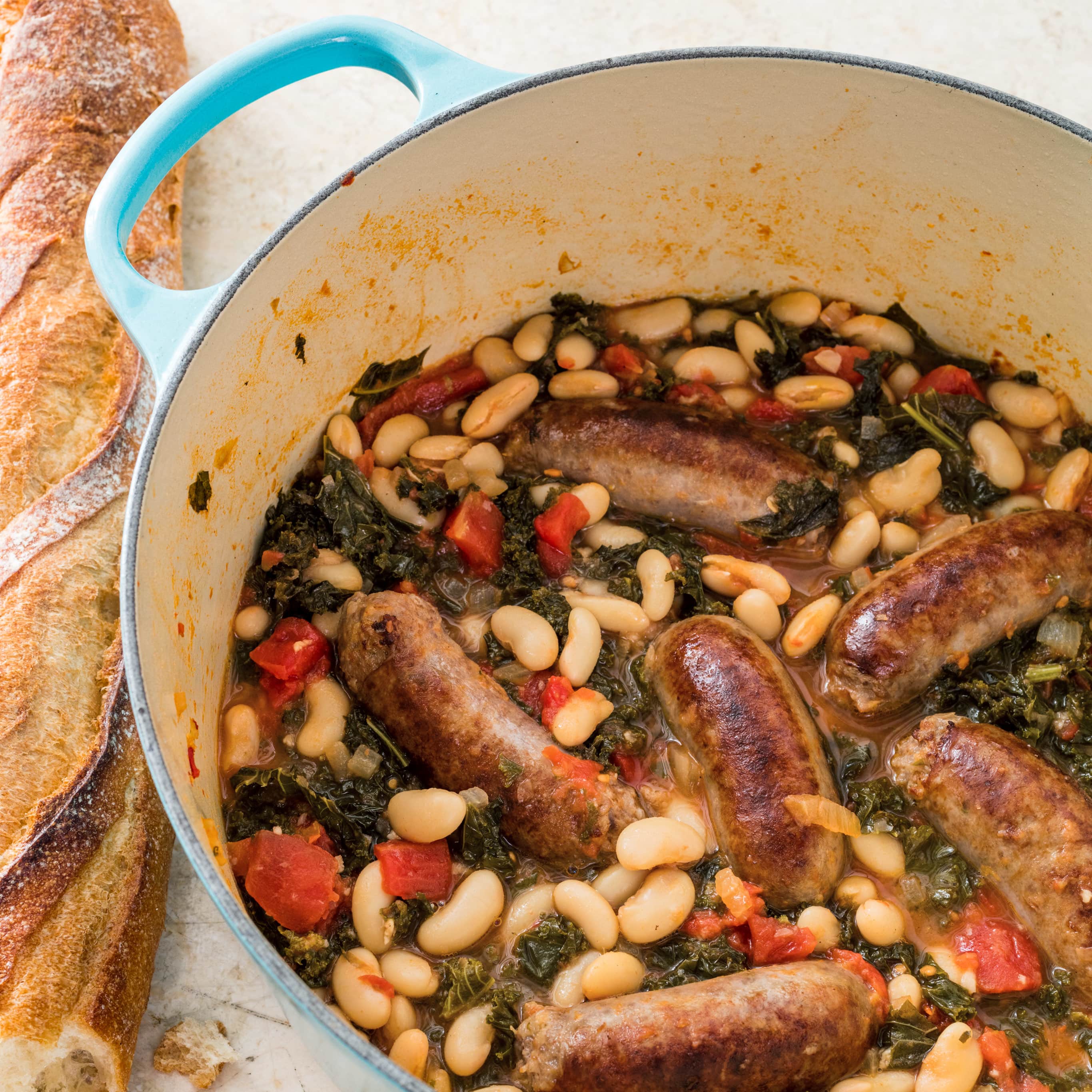 One-Pan Italian Sausage with White Beans and Kale | America's Test Kitchen