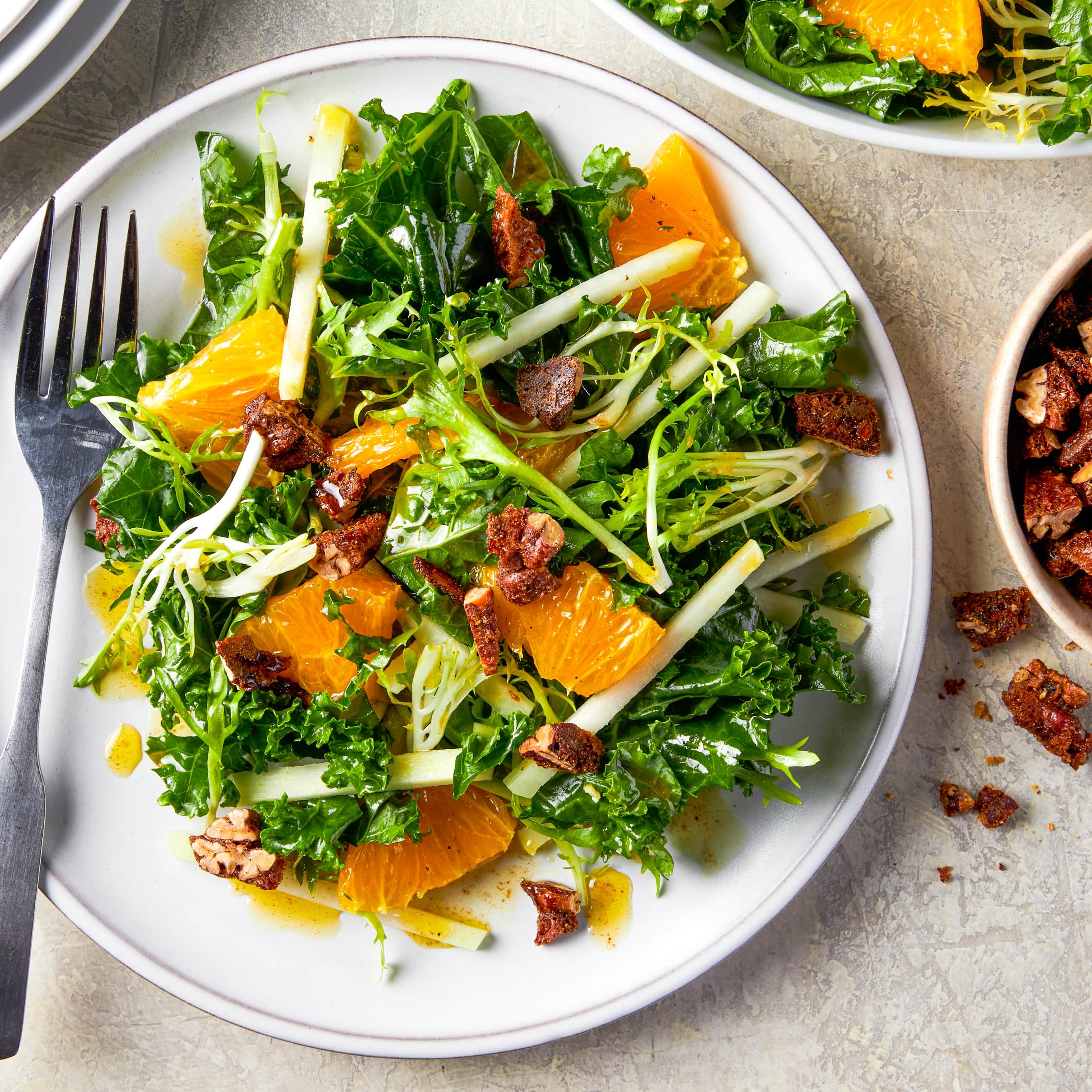 Kale Salad with Kohlrabi, Orange, and Candied Pecans | America's Test Kitchen
