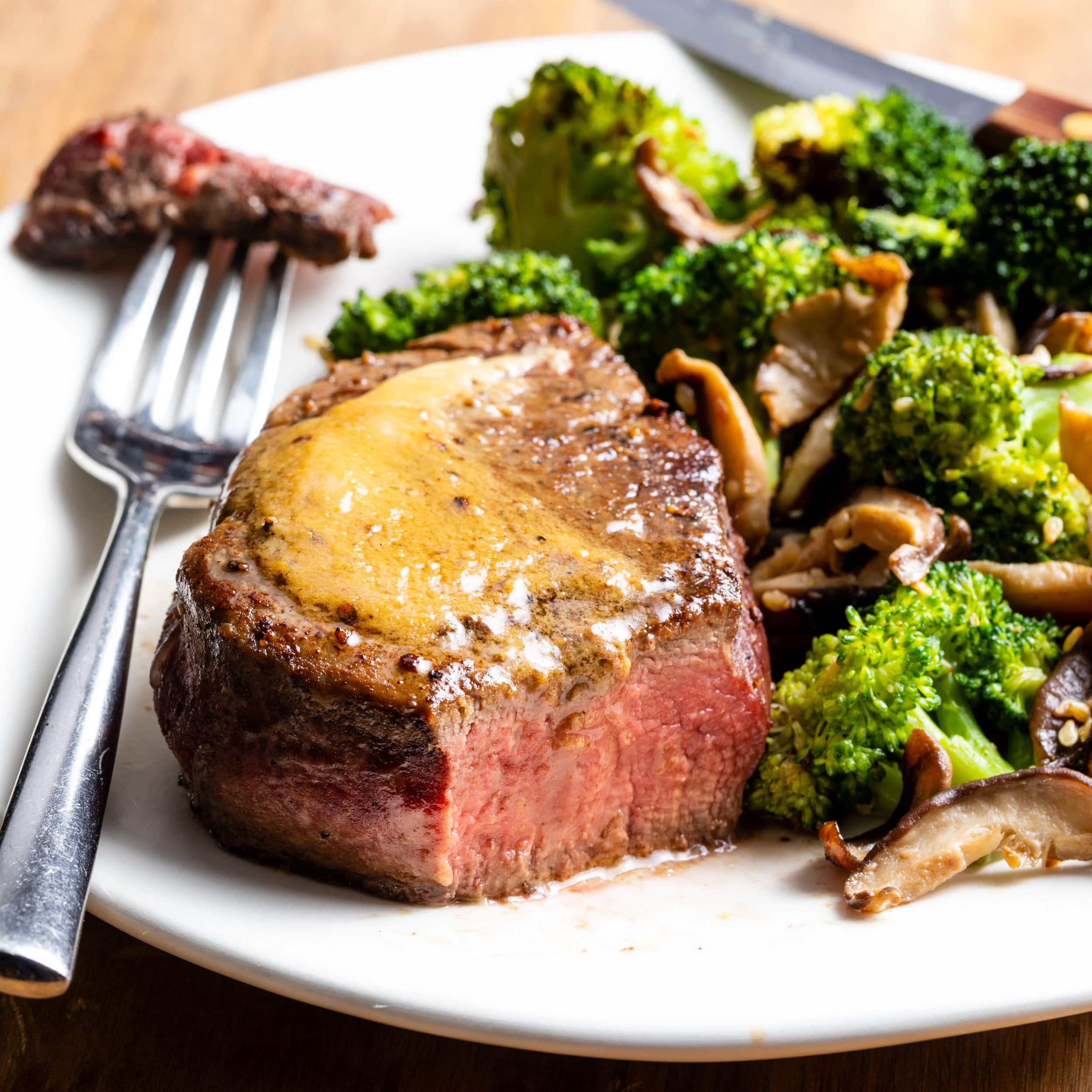 Miso Butter Steaks with Shiitakes and Broccoli | America's Test Kitchen