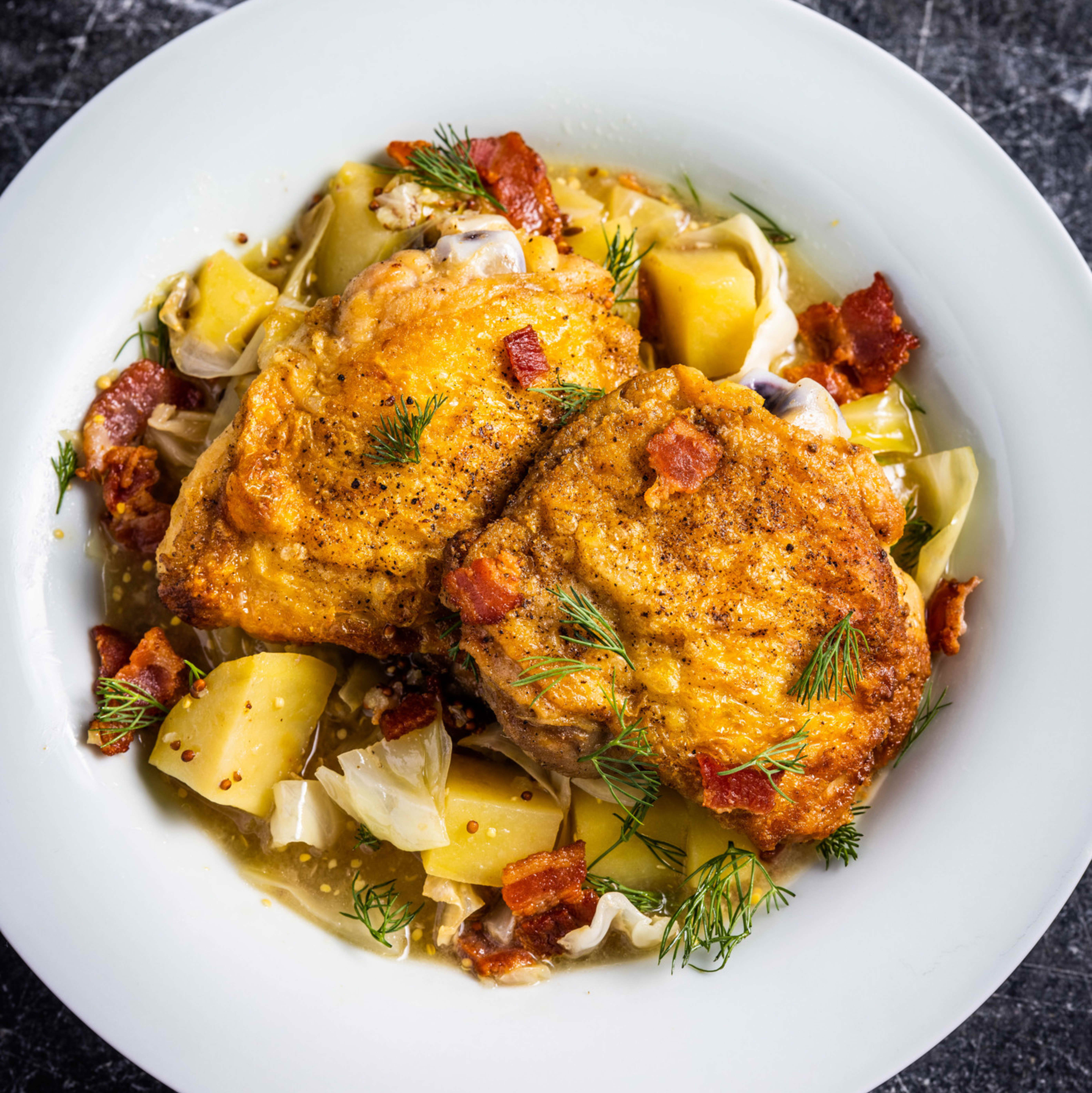 One-Pan Chicken Thighs with Sautéed Cabbage and Potatoes