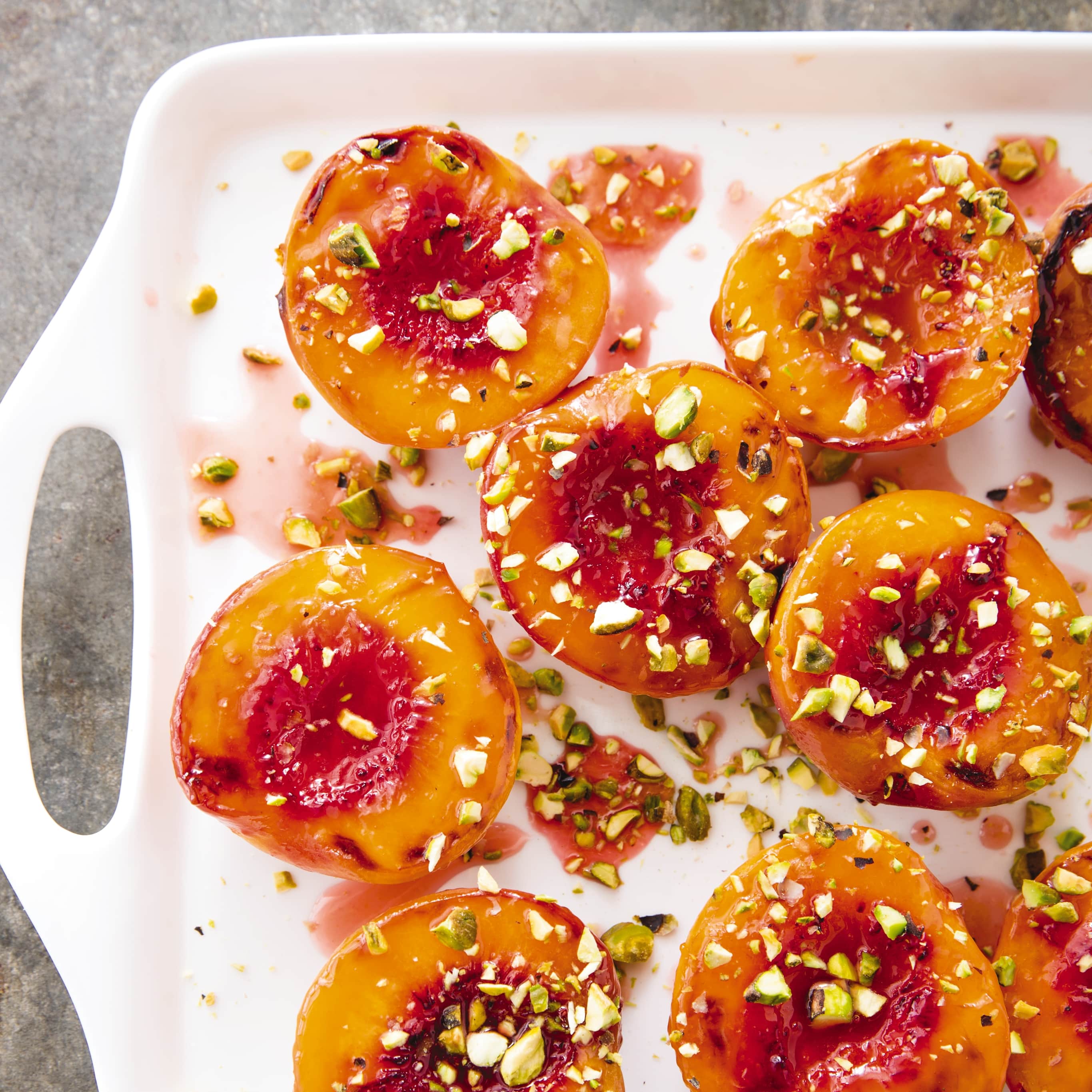 Cast Iron Glazed Peaches with Pistachios