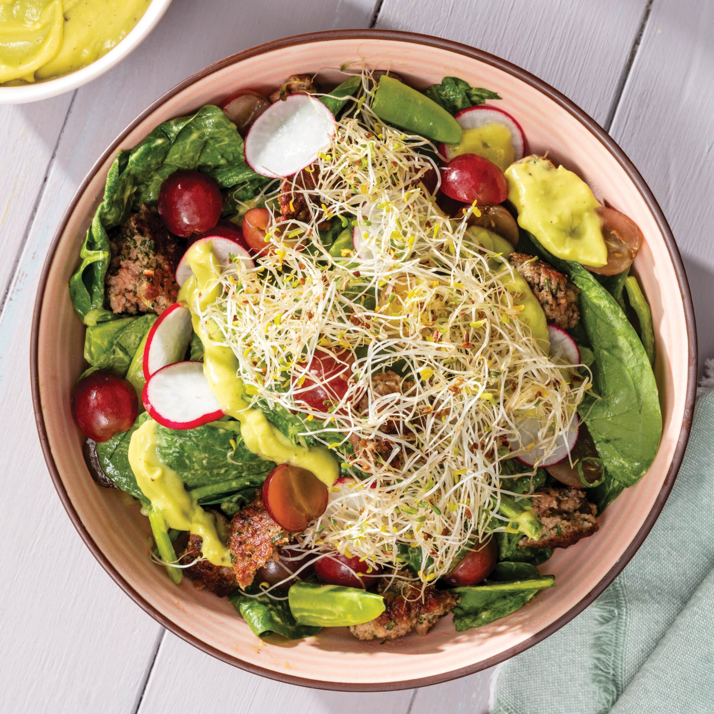 Spinach and Snap Pea Salad Bowl with Herbed Plant-Based Meat Patties