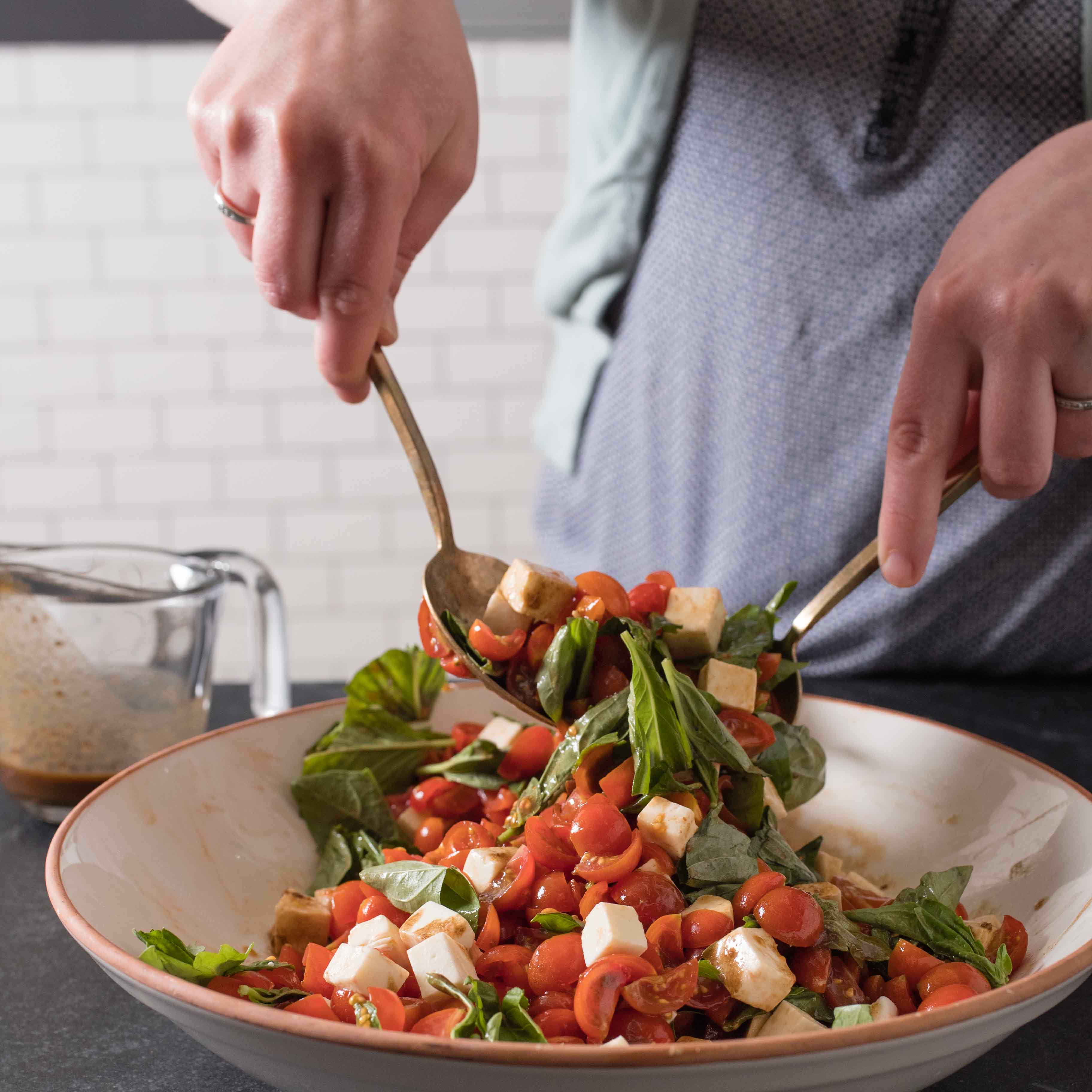 Cherry Tomato Salad with Basil and Fresh Mozzarella | America's Test Kitchen
