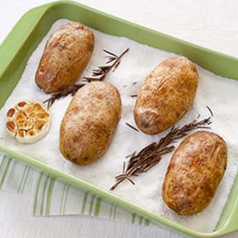 Salt-Baked Potatoes with Roasted Garlic and Rosemary Butter ...
