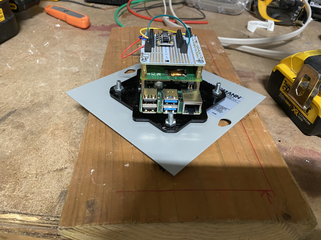 Pi mounted to C4 Labs Zebra VESA mount to Wiegmann enclosure lid