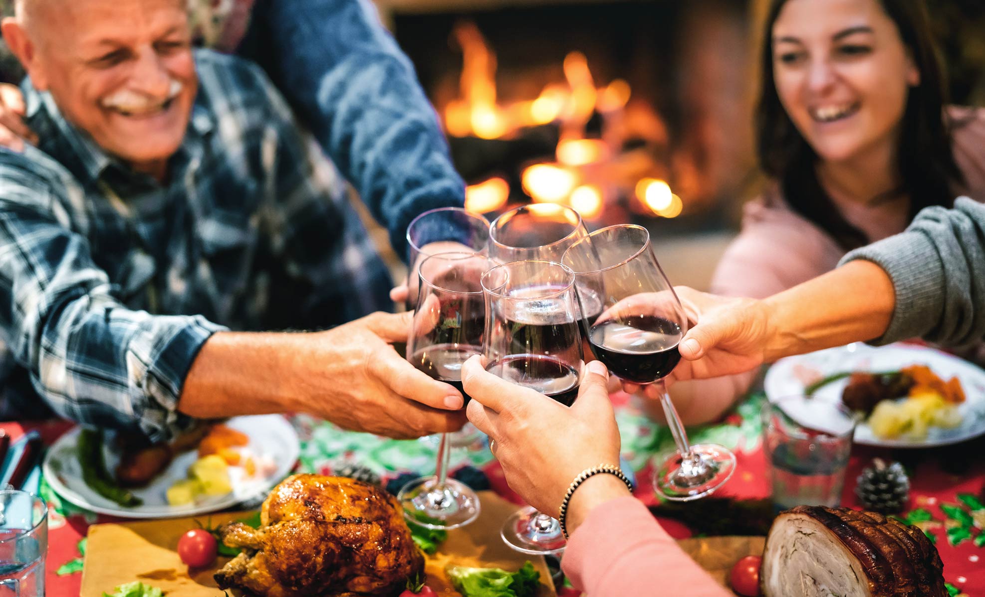 family toasting at holiday dinner