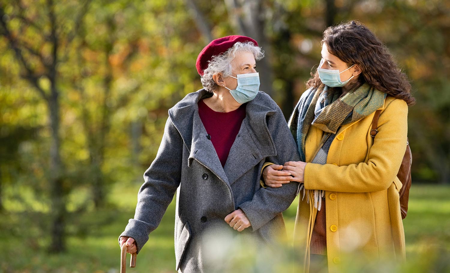 senior with daughter taking a walk