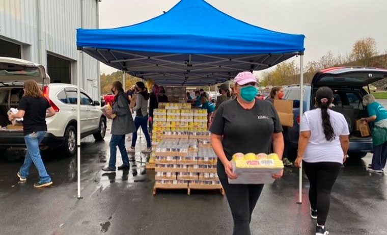 Harvest Food Bank & HMG transporting food