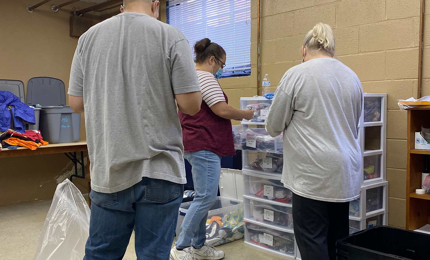 volunteers sorting donated supplies