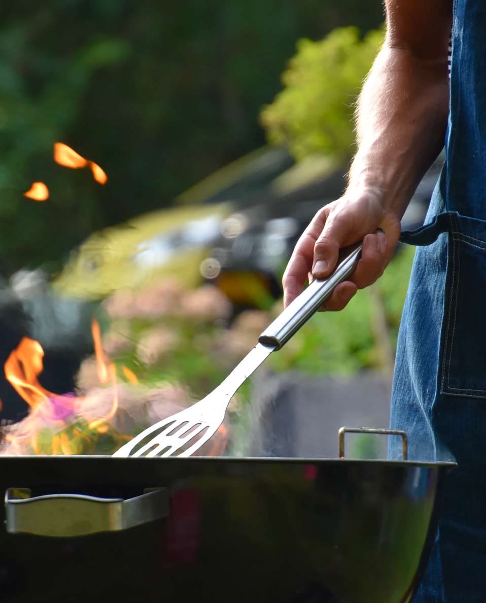 guy cooking on the grill