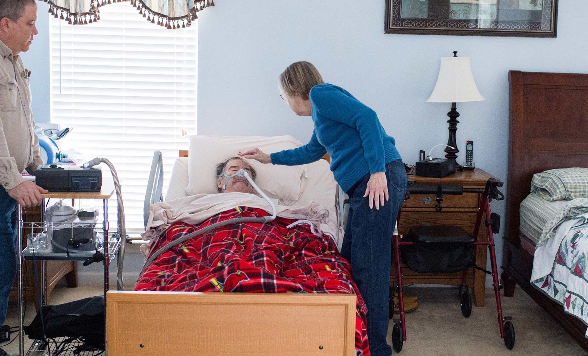 volunteer providing care for ALS patient volunteer providing care for ALS patient