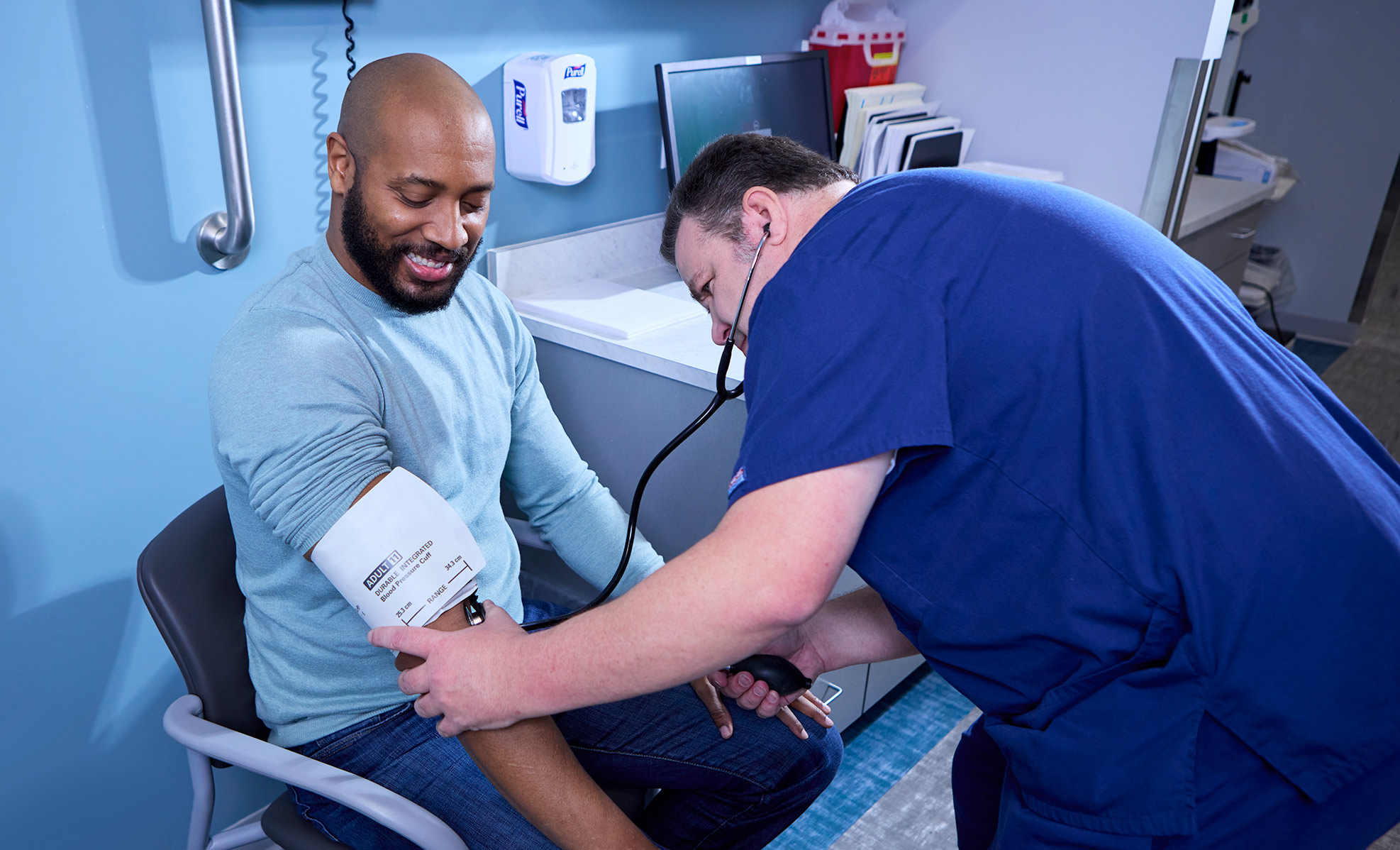 patient getting blood pressure taken