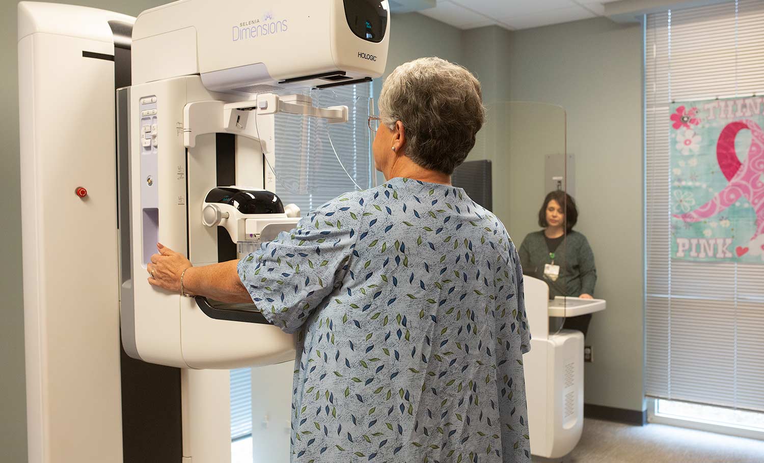 senior patient getting a mammogram