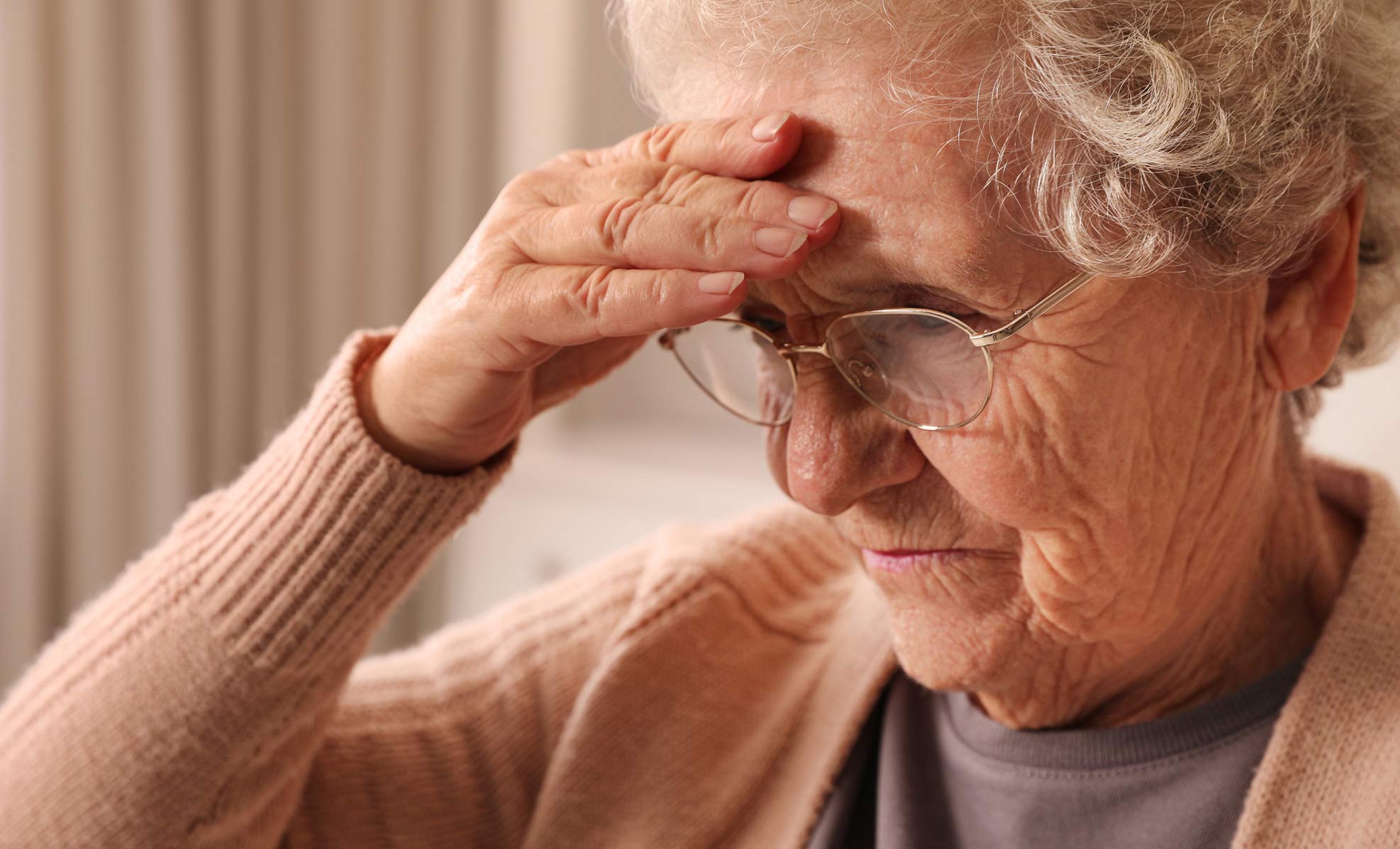 Elderly woman forgetting something