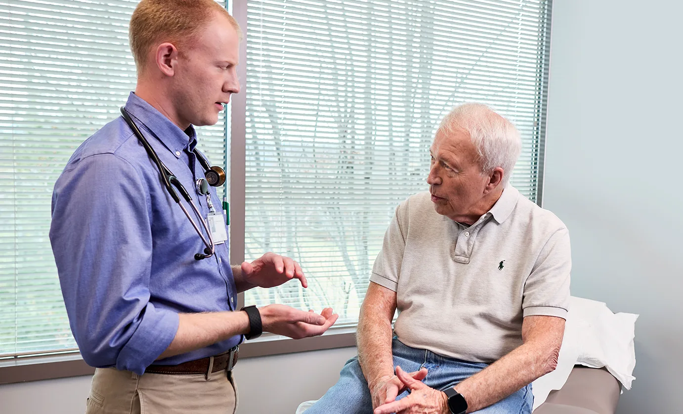 Dr. French talking to a patient