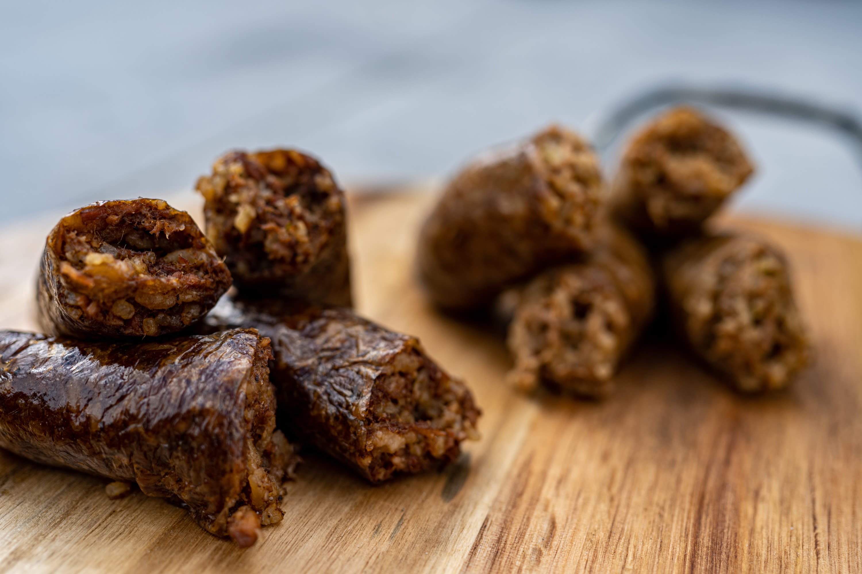 Smoked and pork boudin on a cutting board