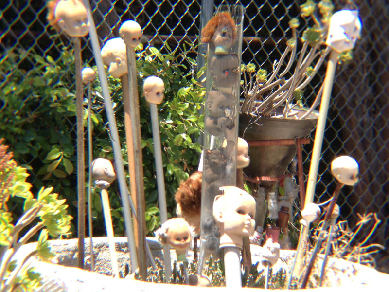 NO. 939  GRANDMA PRISBREY'S BOTTLE VILLAGE - Doll Heads