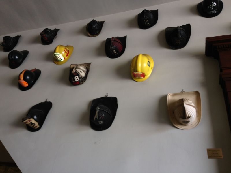 NO. 730 OLD PLAZA FIREHOUSE -Collection of Fireman Helmets