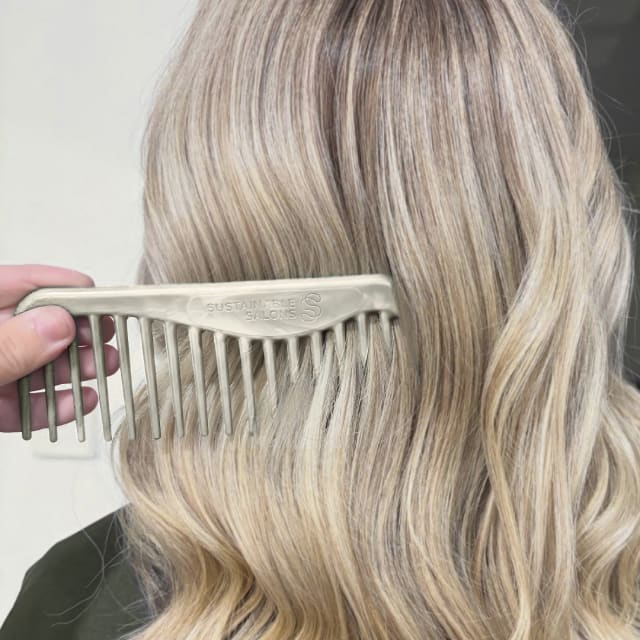 Cream comb in hair
