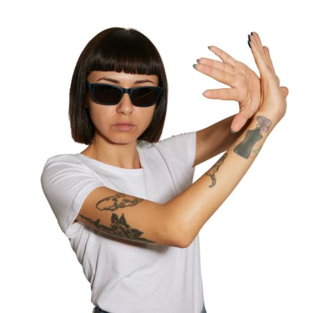 Image of a person wearing sunglasses
