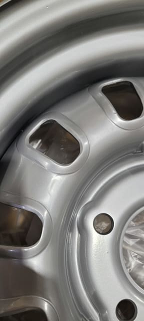 (MINOR BLEMISHES) 14X7 SILVER 12 SLOT STEEL WHEEL 5-114.3 PCD. 0ET