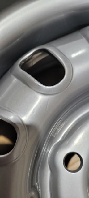 (MINOR BLEMISHES) 14X7 SILVER 12 SLOT STEEL WHEEL 5-114.3 PCD. 0ET