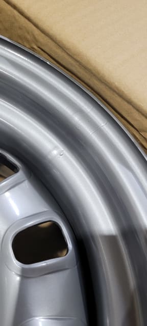 (MINOR BLEMISHES) 14X7 SILVER 12 SLOT STEEL WHEEL 5-114.3 PCD. 0ET