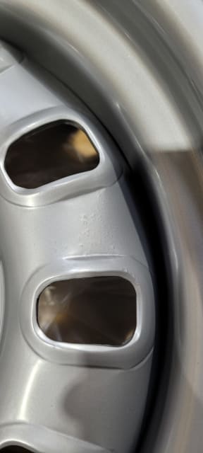 (MINOR BLEMISHES) 14X7 SILVER 12 SLOT STEEL WHEEL 5-114.3 PCD. 0ET