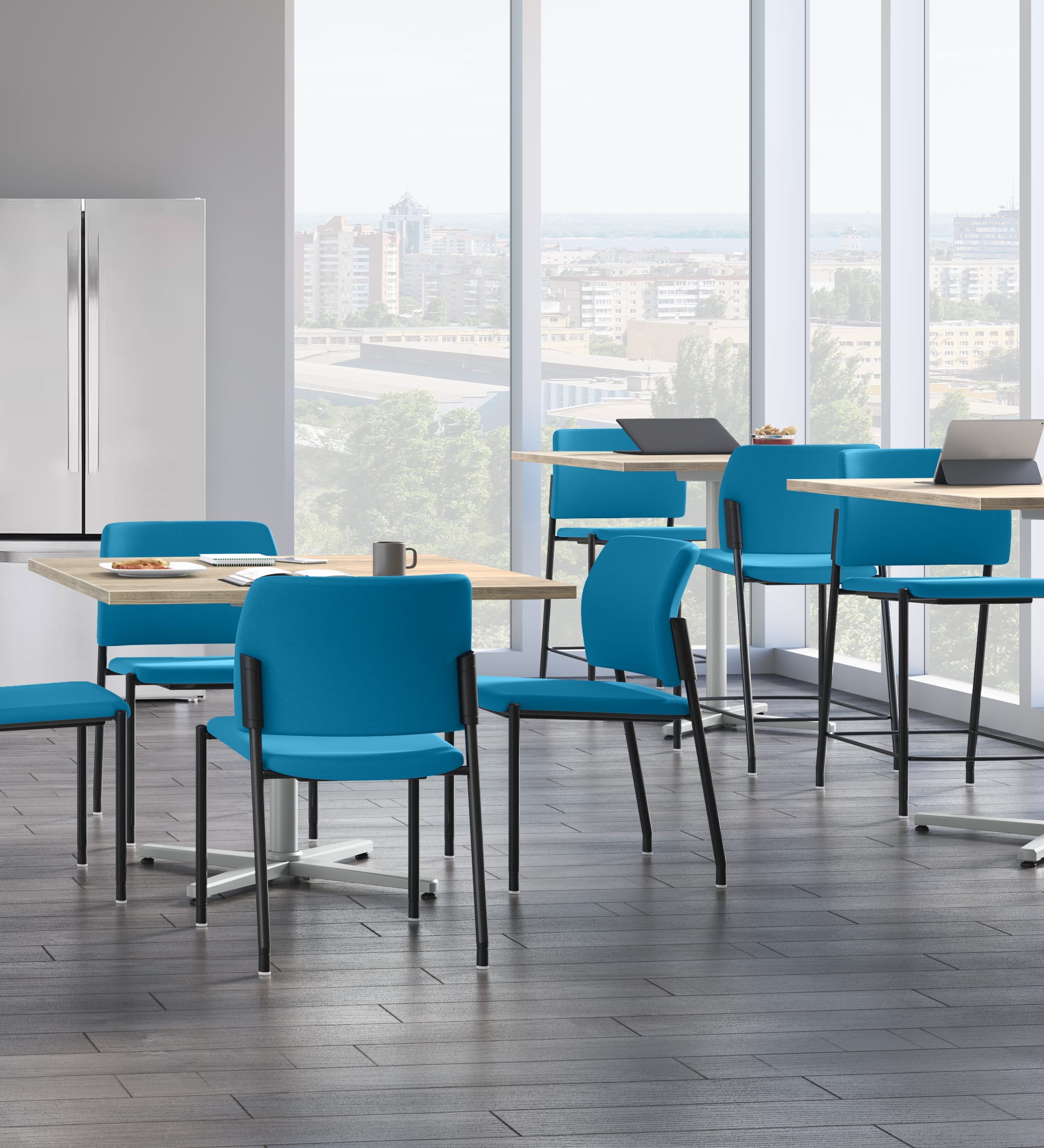 A cafe space featuring Accommodate chairs and stools with Arrange tables.