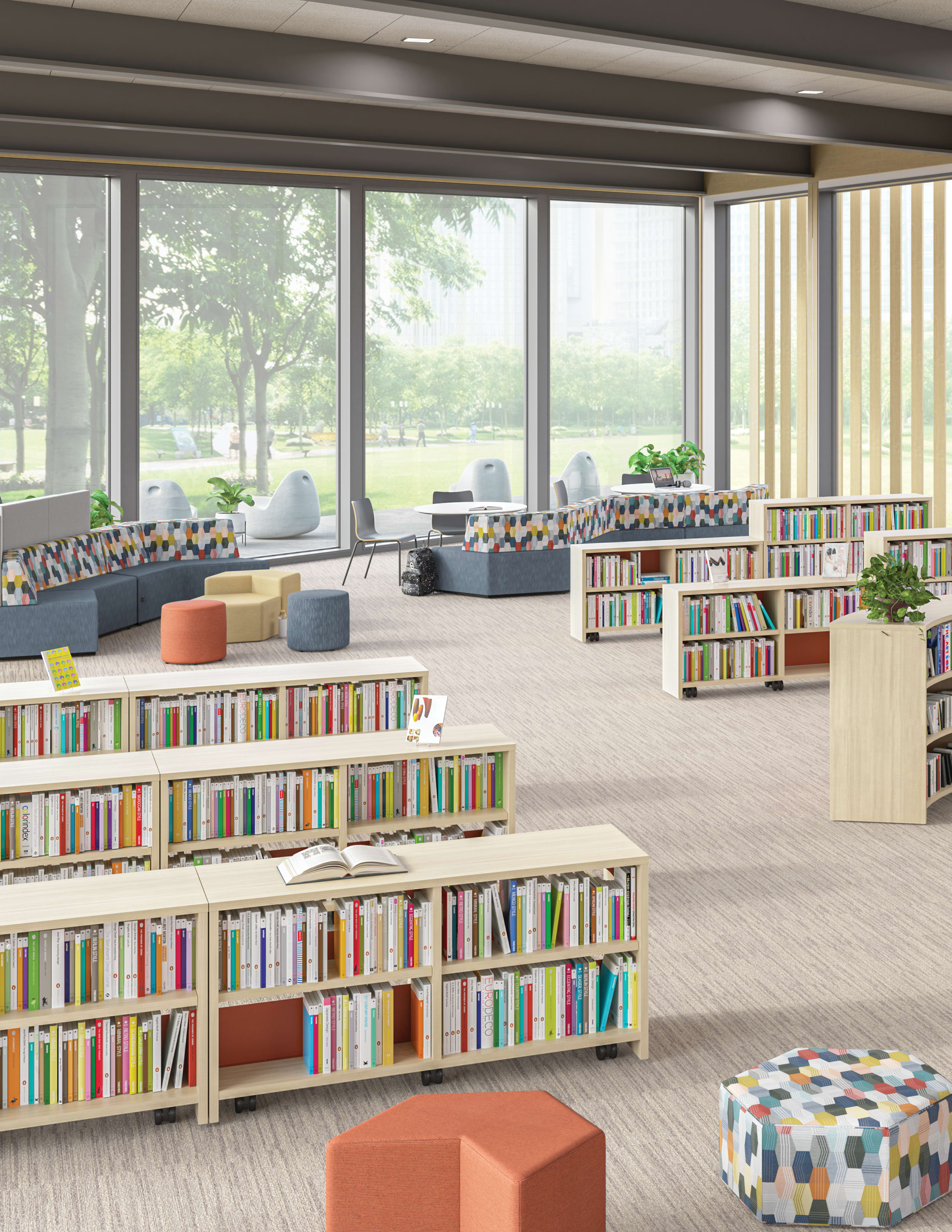 School media center featuring rows of Storyline bookcases and bistro tables to create spaces for reading or studying.
