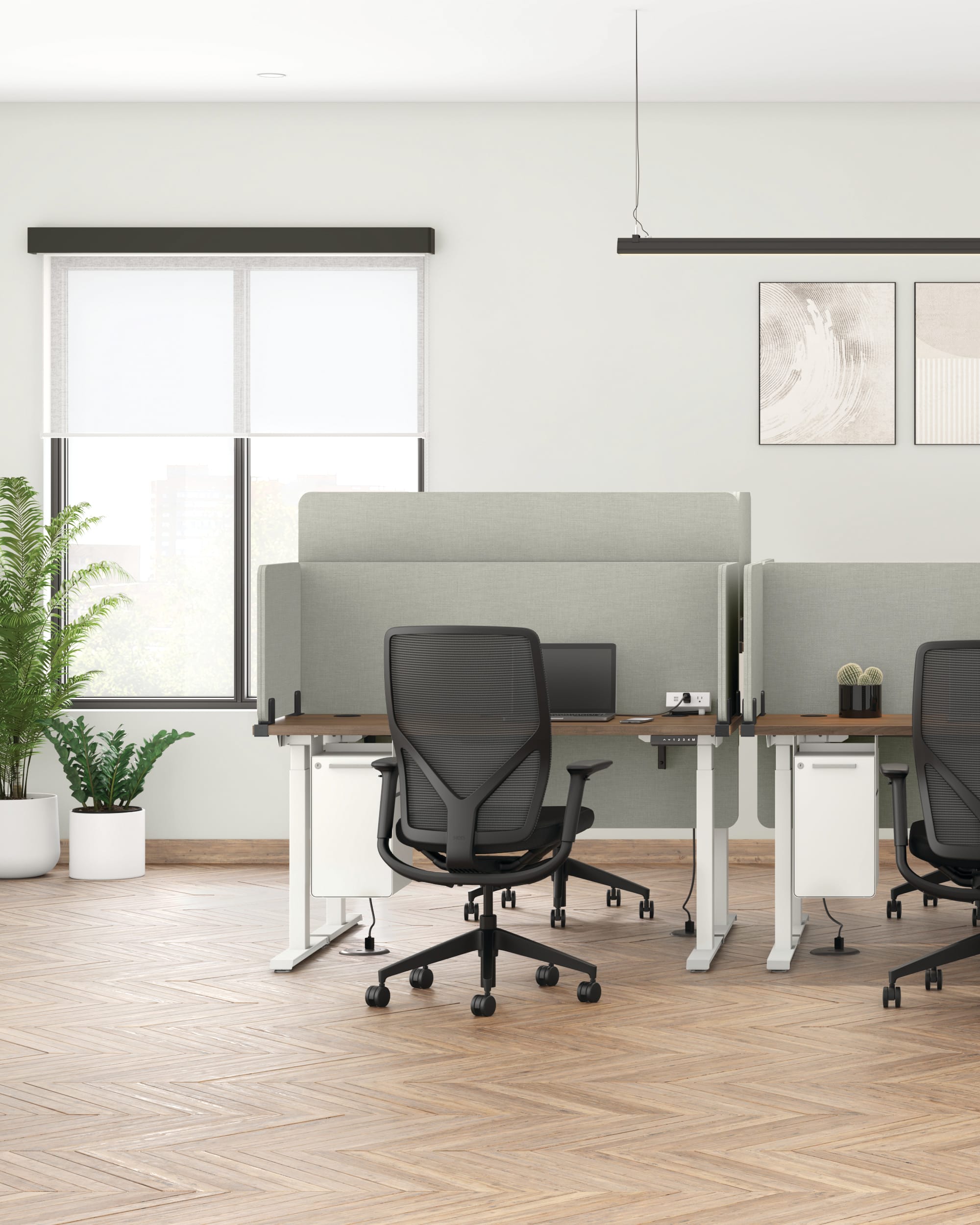 Flexion task chair in CU10 Centurion Black fabric.  Coordinate Height-Adjustable desk in  PINC Pinnacle worksurface and  DW Designer White base. Universal Screens  in APN16 Appoint Nimbus screens and P71 Black brackets. Fuse Caddy in PJW Designer White
