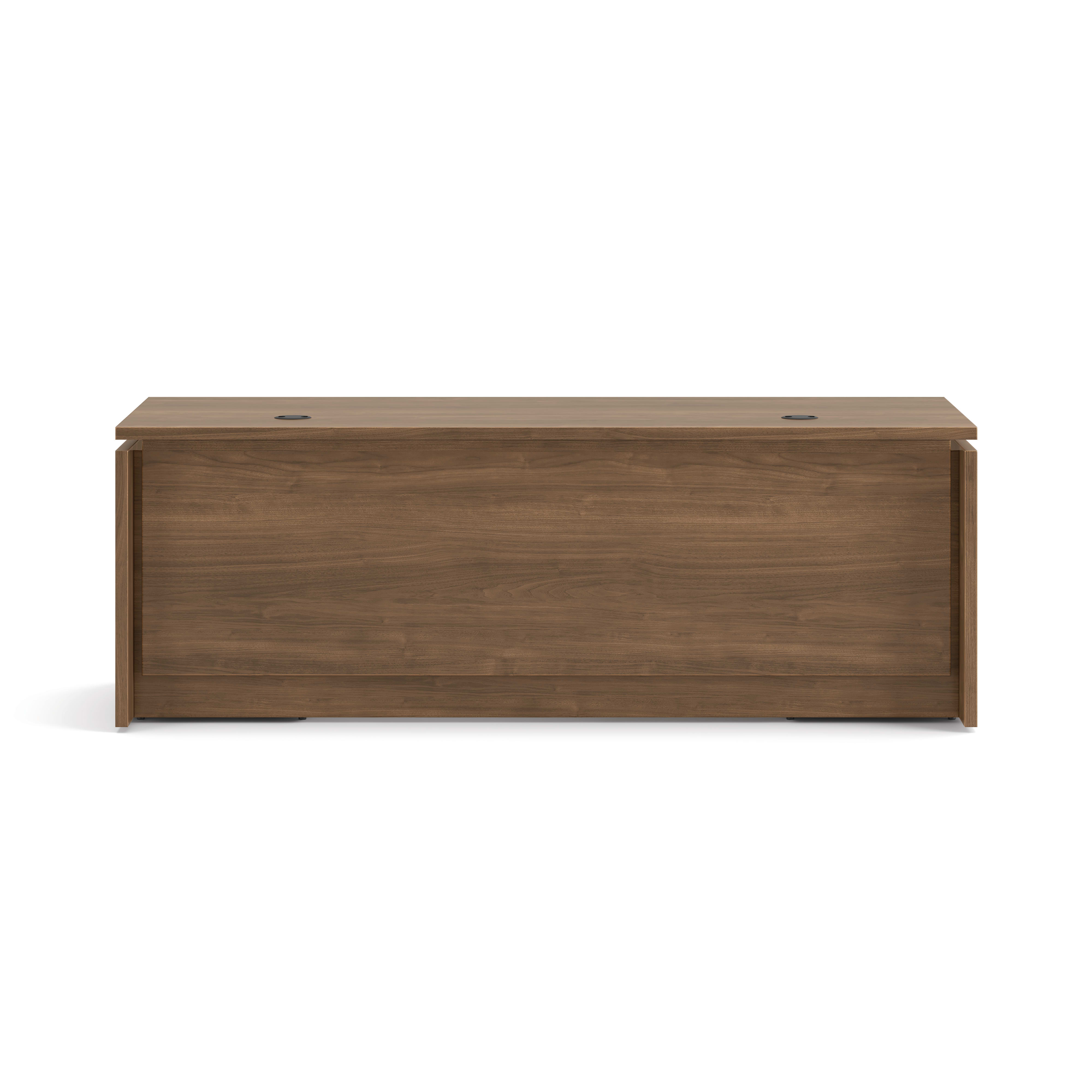 Double pedestal executive desk with woodgrain finish, integrated power access, and built-in file storage.