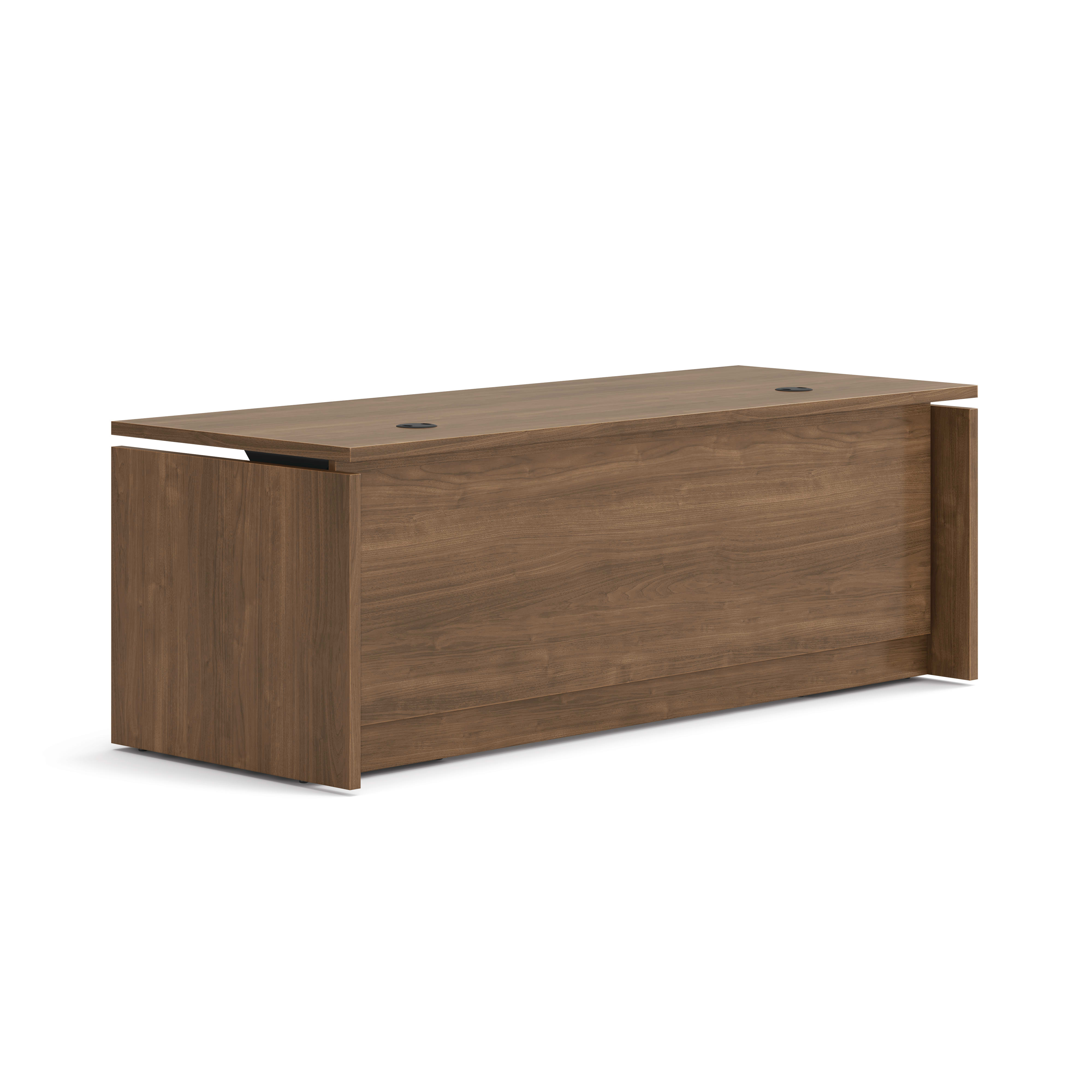 Double pedestal executive desk with woodgrain finish, integrated power access, and built-in file storage.