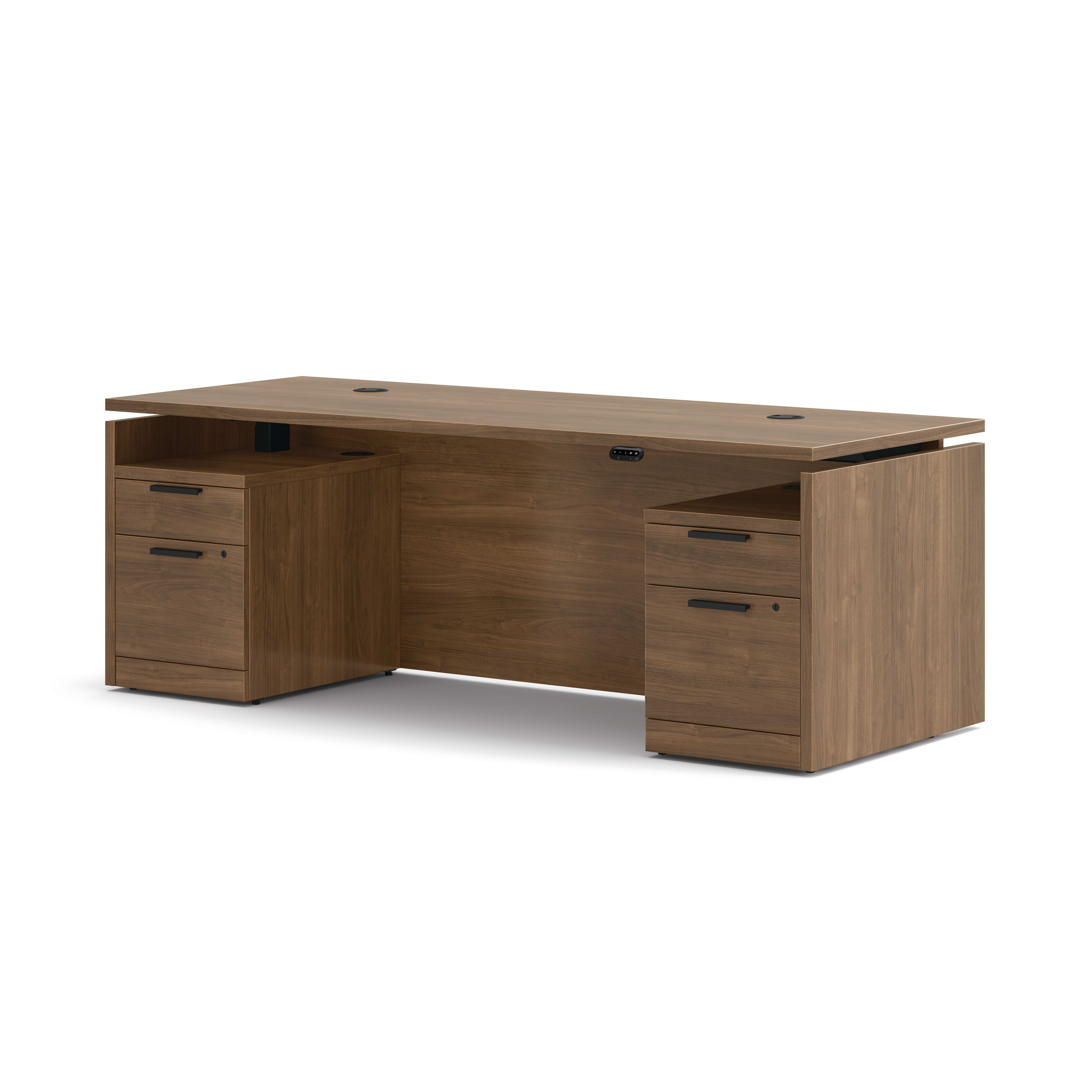 Double pedestal executive desk with woodgrain finish, integrated power access, and built-in file storage.
