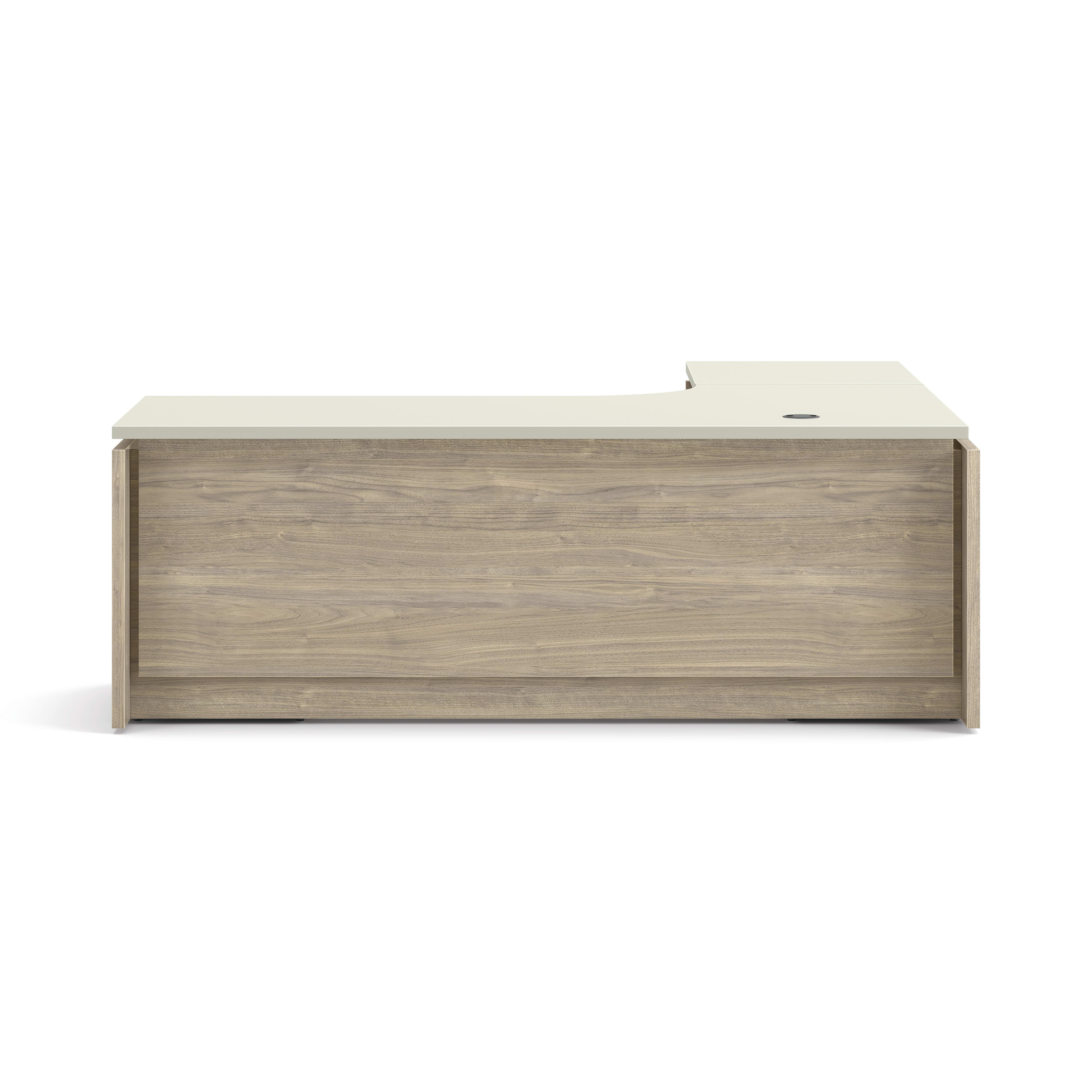 L-shaped executive desk with woodgrain finish, integrated power access, and pedestal storage in a modern two-tone design.