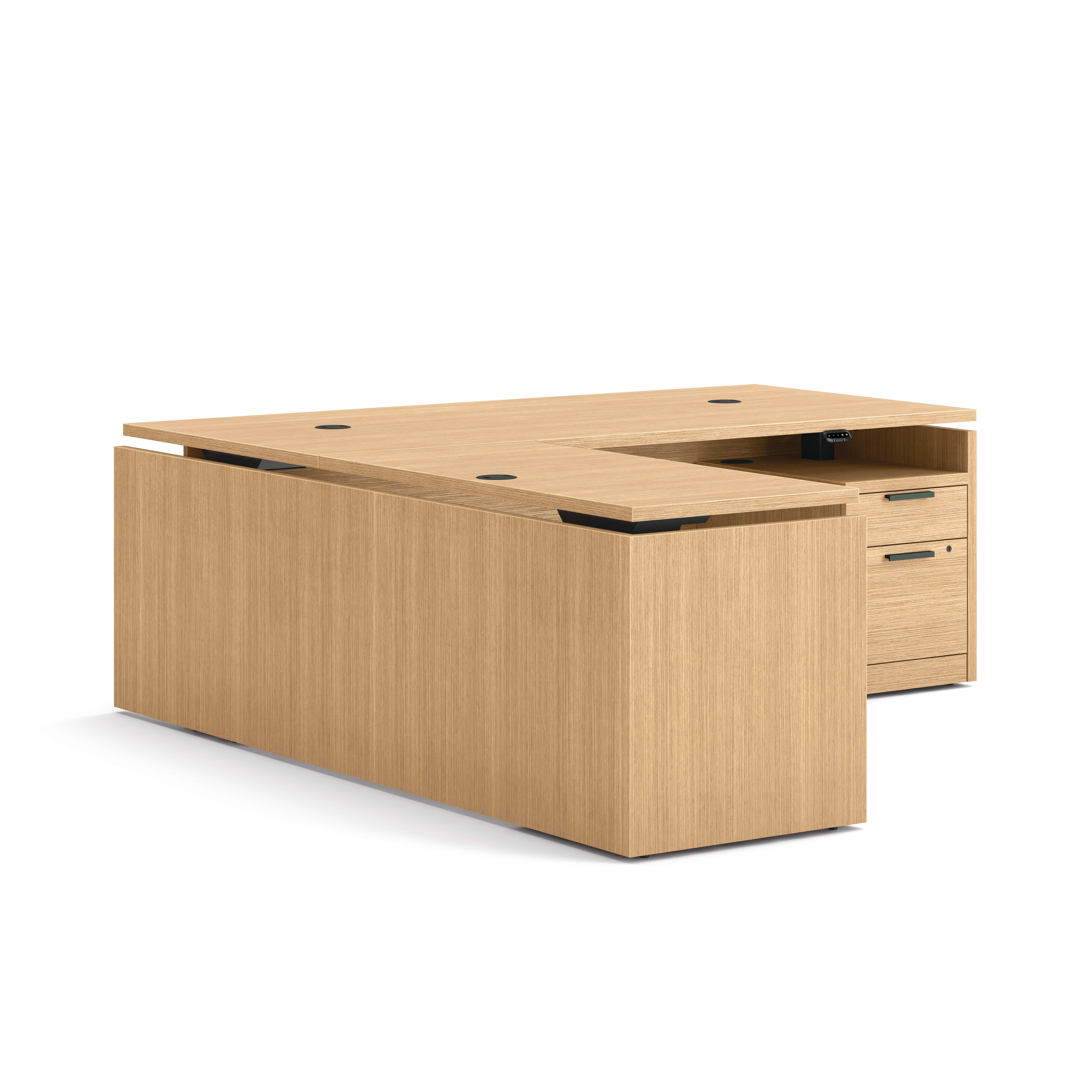 L-shaped executive workstation with woodgrain finish, integrated power access, and pedestal file storage.
