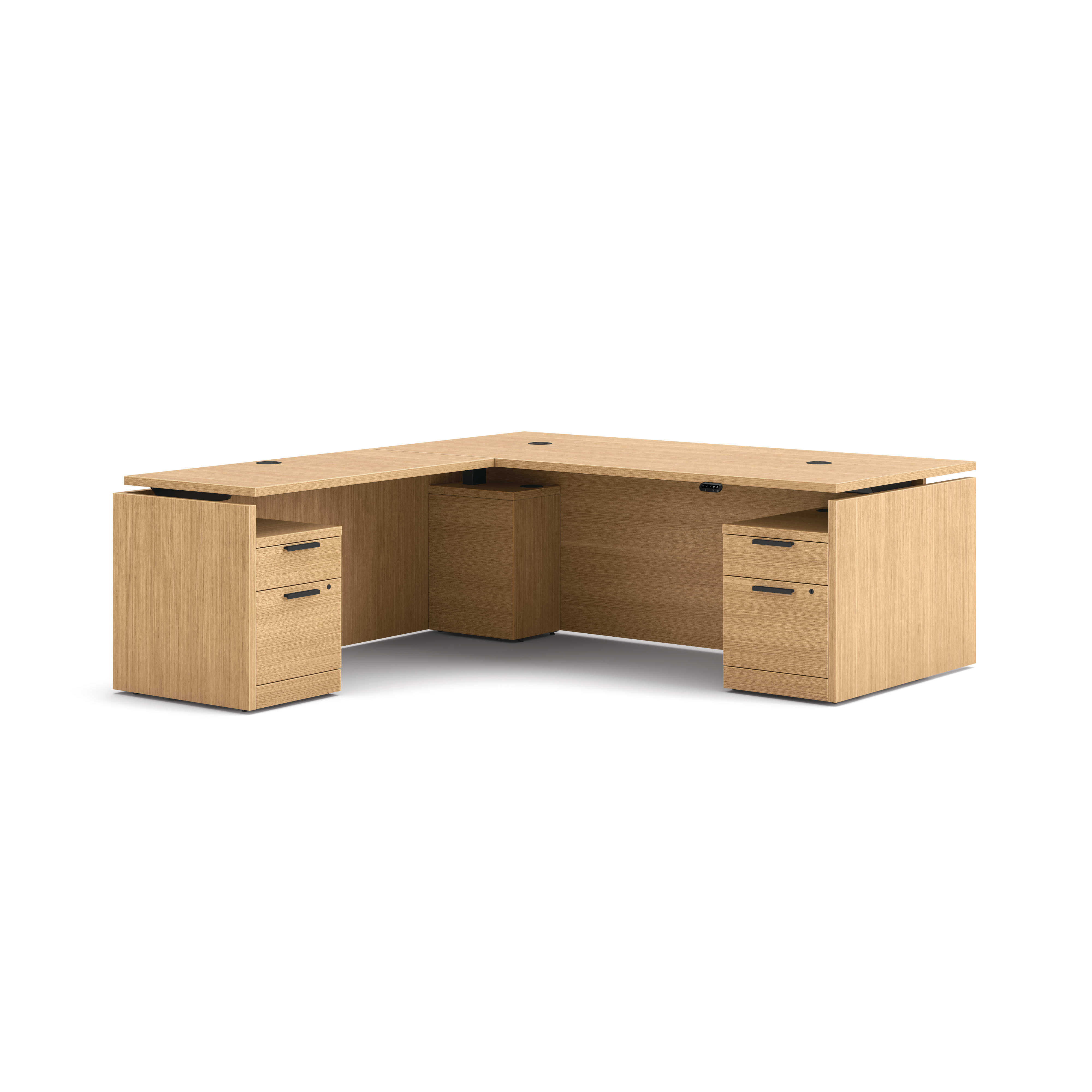 L-shaped executive workstation with woodgrain finish, integrated power access, and pedestal file storage.