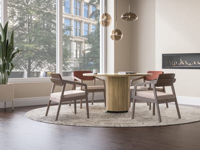 Confer guest chair with Preside laminate cylinder base and Sculpt planter.