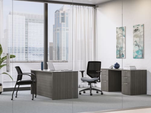 Mod executive desk in Slate Teak with Solve task chair and Ignition guest chair