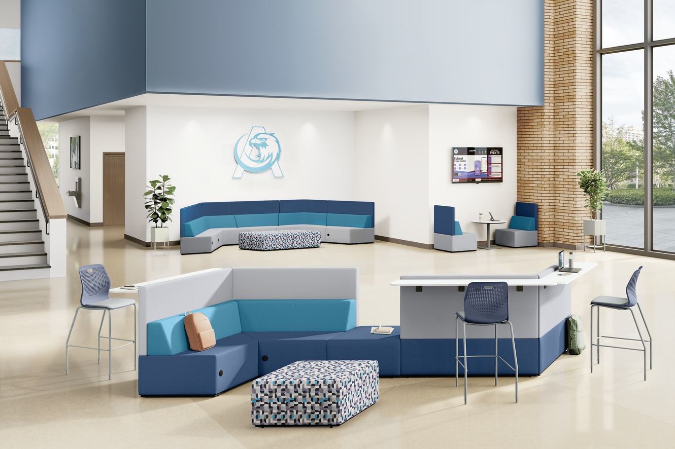 Collaboration space with blue Tangram soft seating and blue Etch chairs