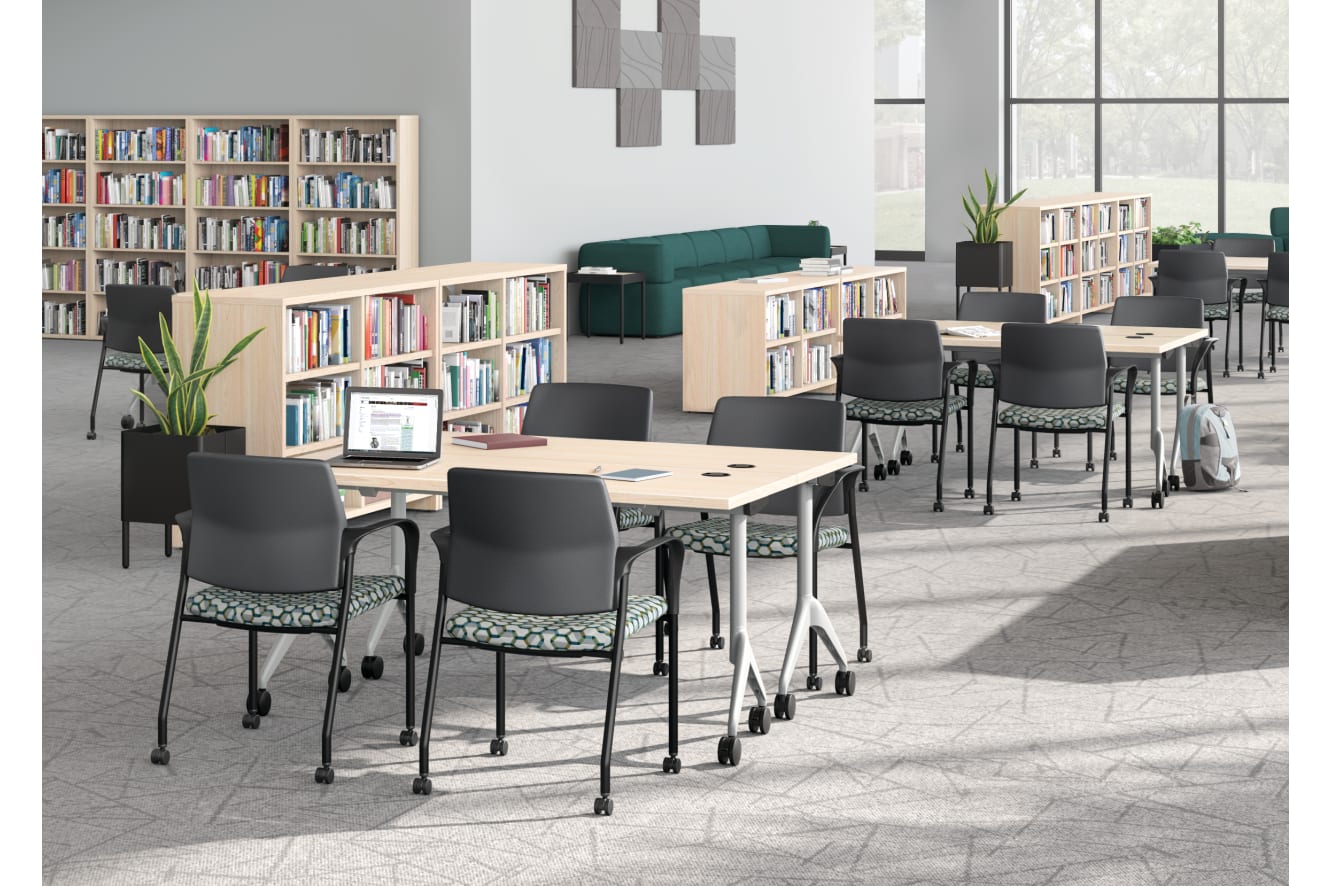 A multi-media center setting featuring SoCo seating, Ignition guest chairs, and Motivate tables.