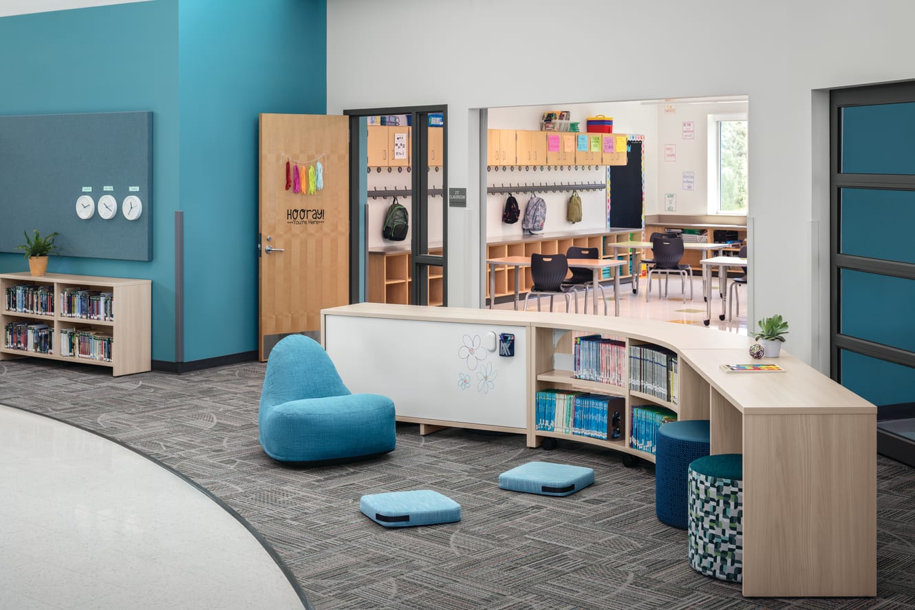 Storyline Bookcases and Bistro Tables with Confetti Floor Cushions and Lounge and Flock Minis.